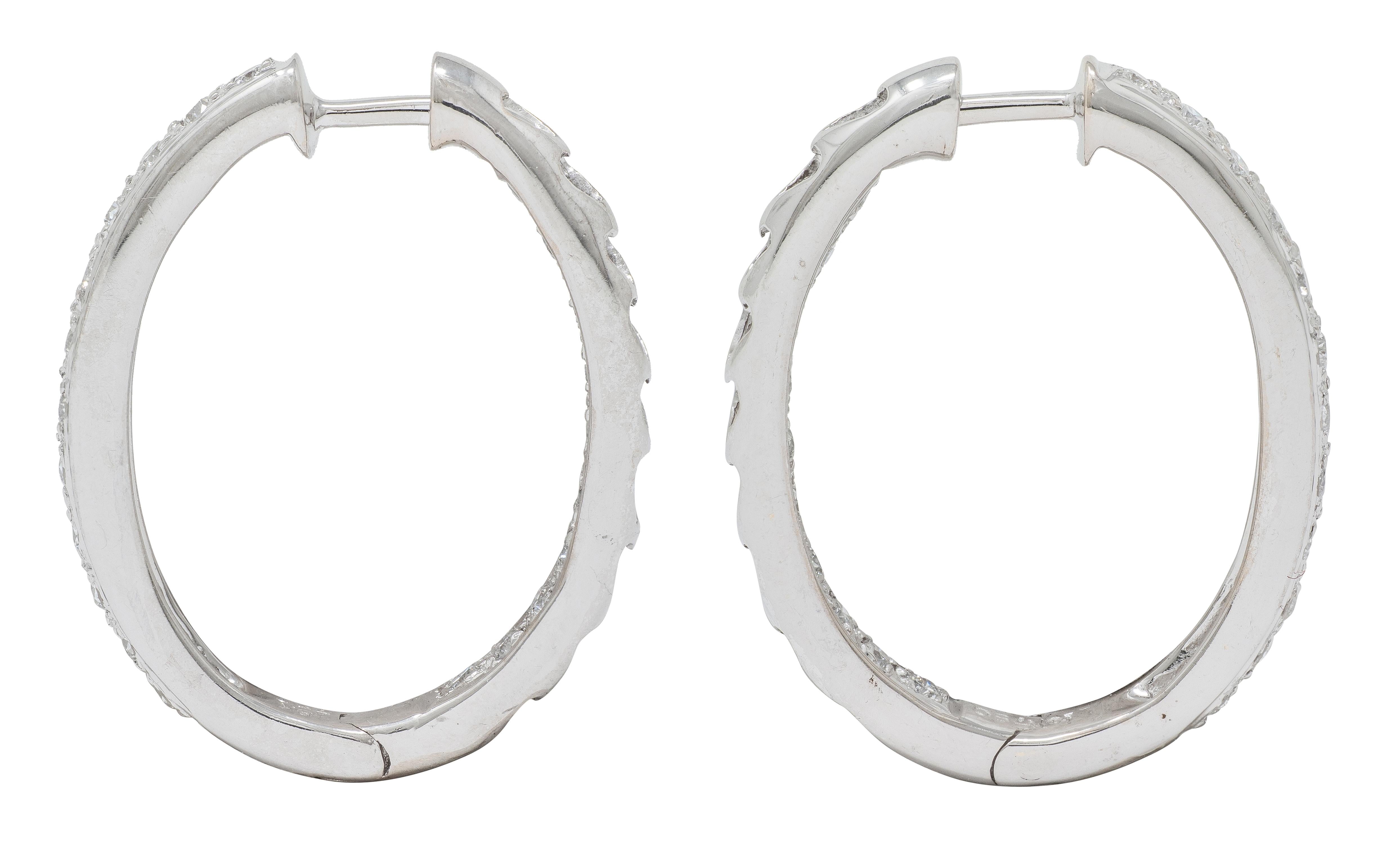 Contemporary 0.66 CTW Diamond 18 Karat White Gold Heart Hoop Earrings