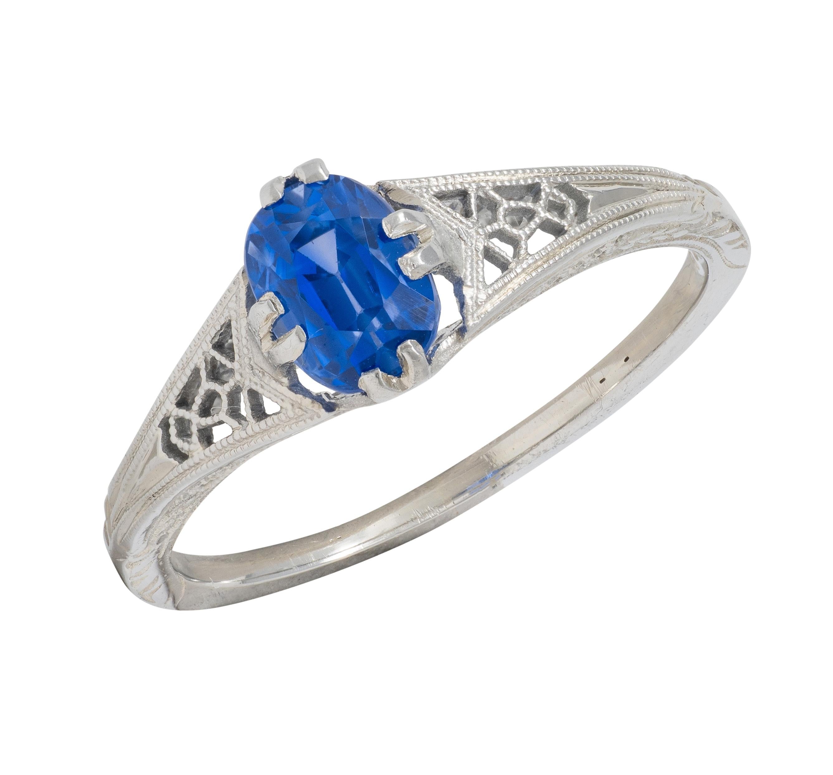 Art Deco 0.93 CTW Oval Cut Sapphire 18 Karat White Gold Vintage Lotus Ring