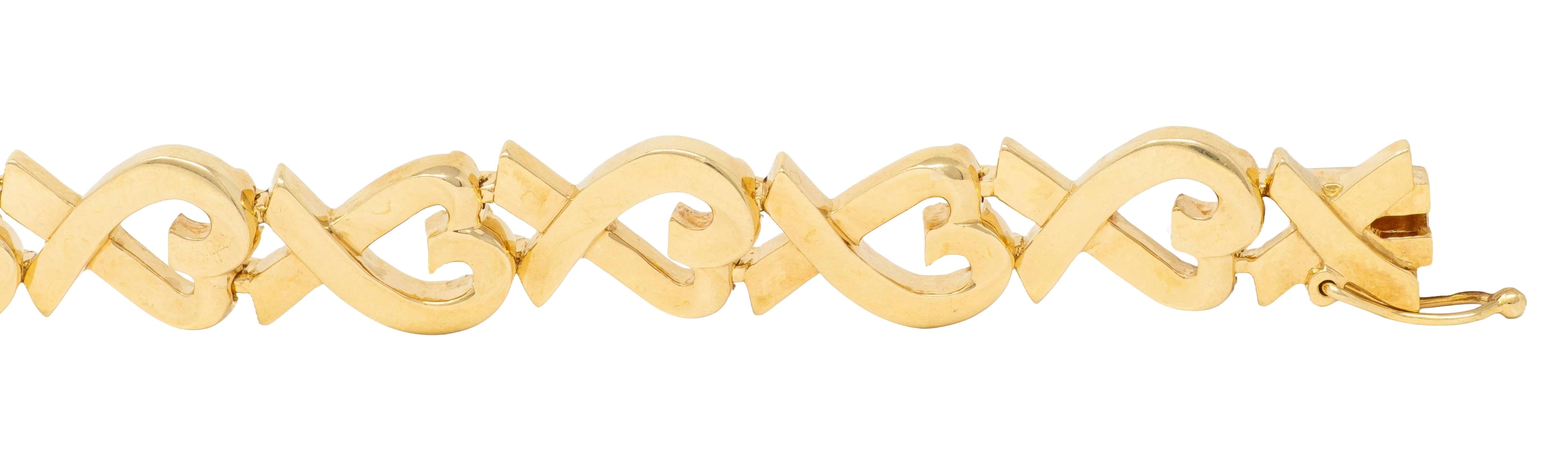 Tiffany & Co. Paloma Picasso 1980's 18K Gold Vintage Loving Hearts Bracelet