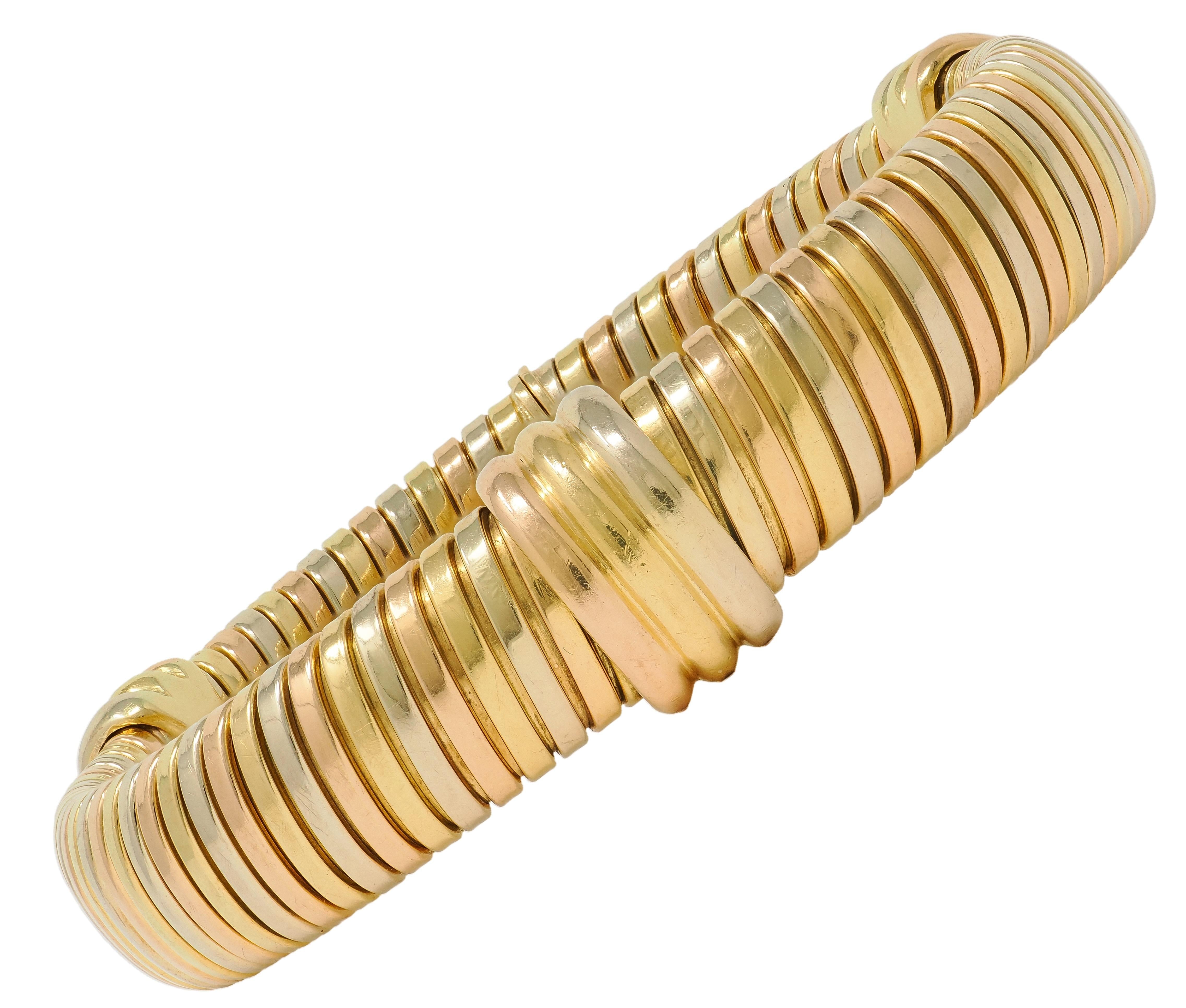 Cartier 1980's Tri-Colored 18 Karat Yellow White Gold Vintage Tubogas Bracelet