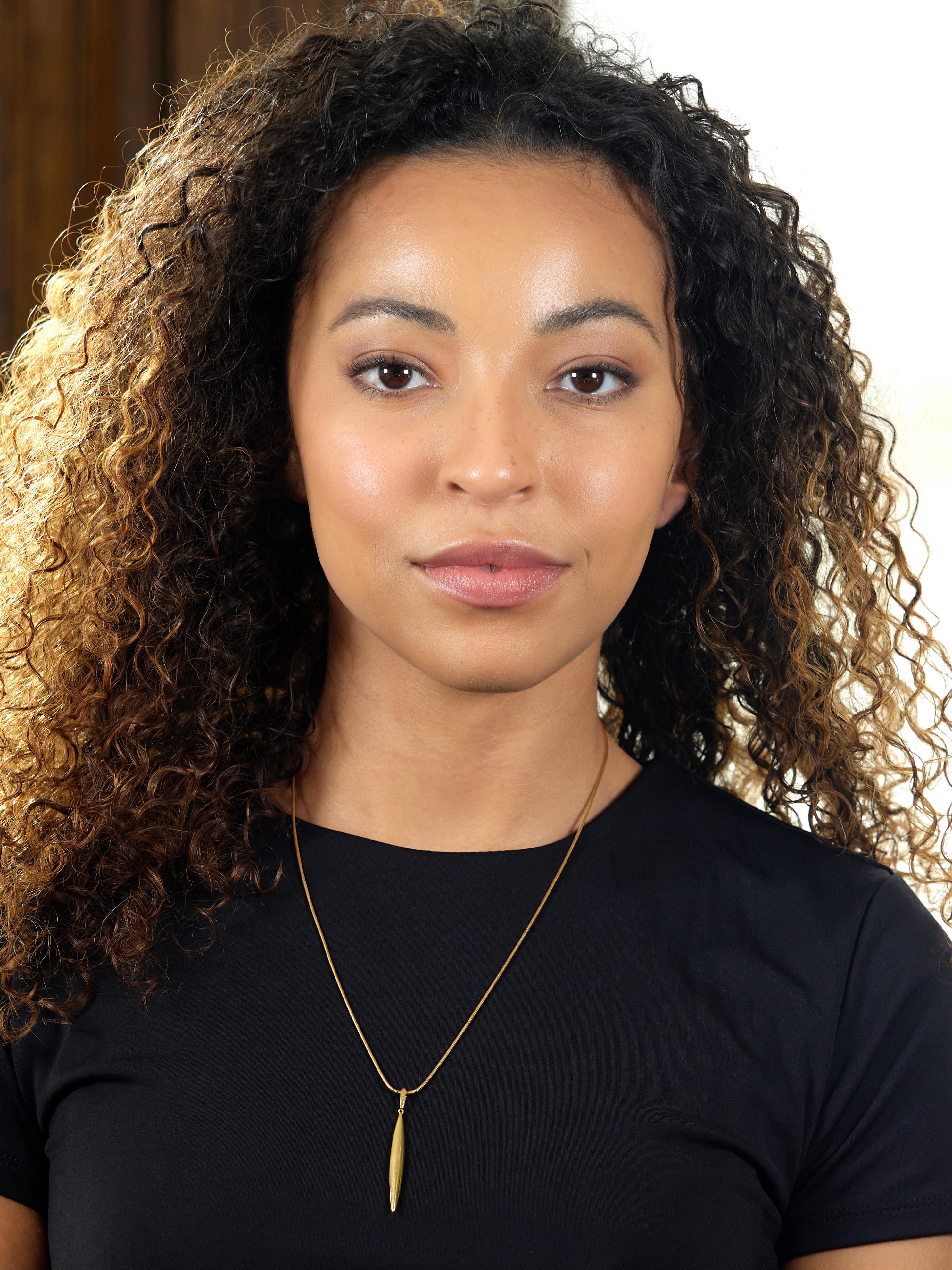 Tiffany & Co. 1990's 18K Yellow Gold Vintage Minimalist Feather Pendant Necklace