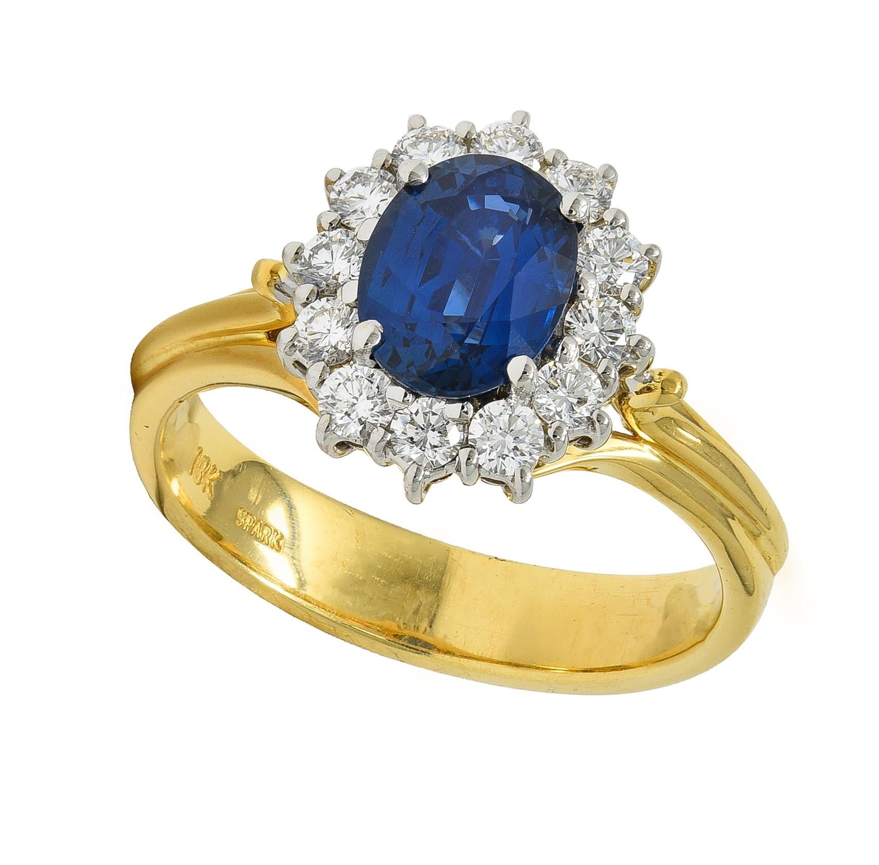 Spark 1990's 2.25 CTW Sapphire Diamond 18 Karat Two-Tone Gold Vintage Halo Ring
