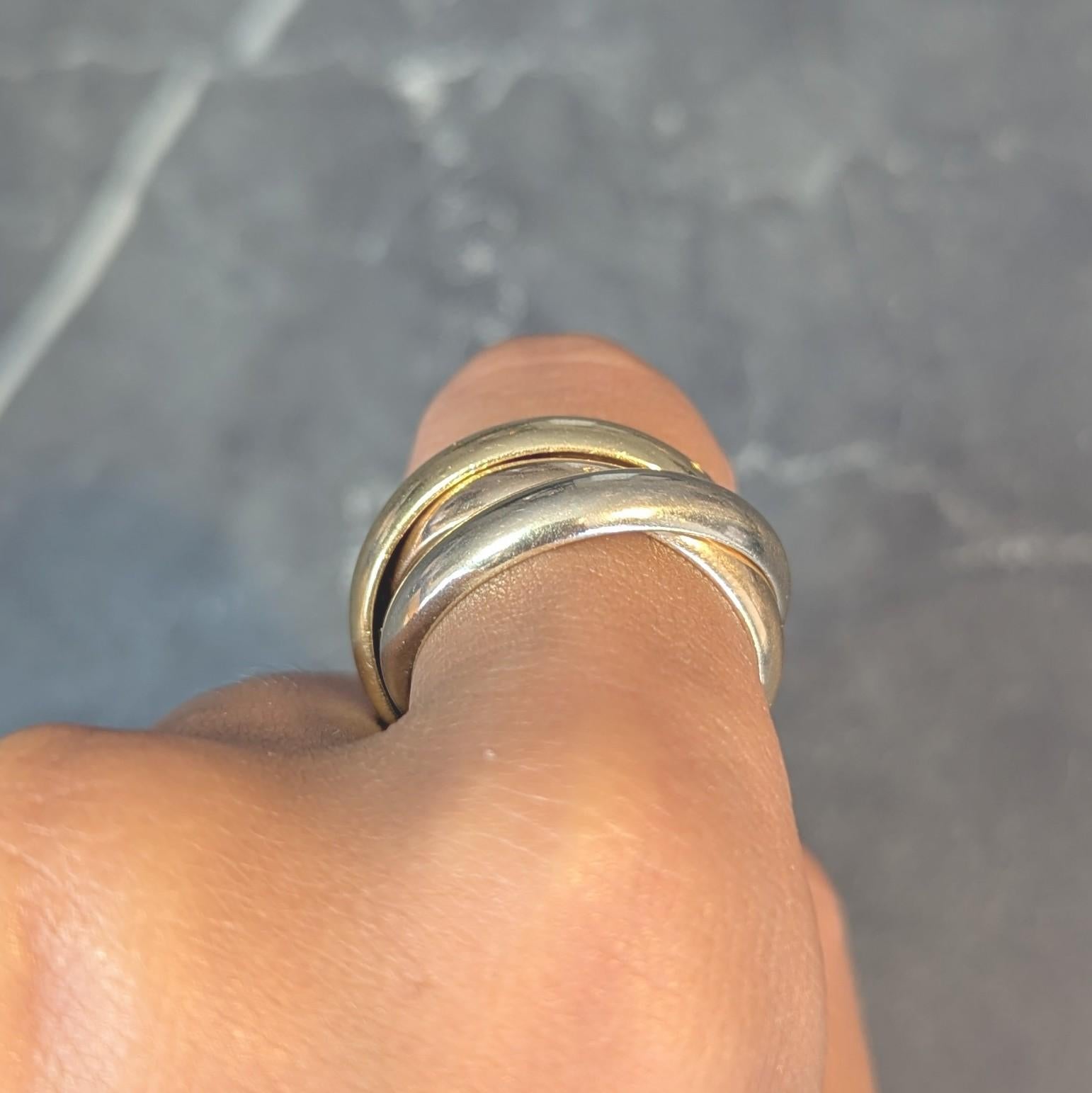 Cartier 1997 French 18 Karat Tri-Colored Gold Vintage Trinity Rolling Band Ring
