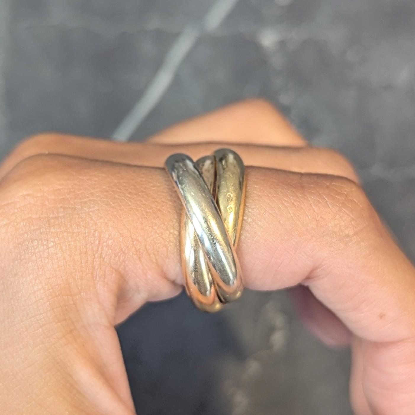 Cartier 1997 French 18 Karat Tri-Colored Gold Vintage Trinity Rolling Band Ring