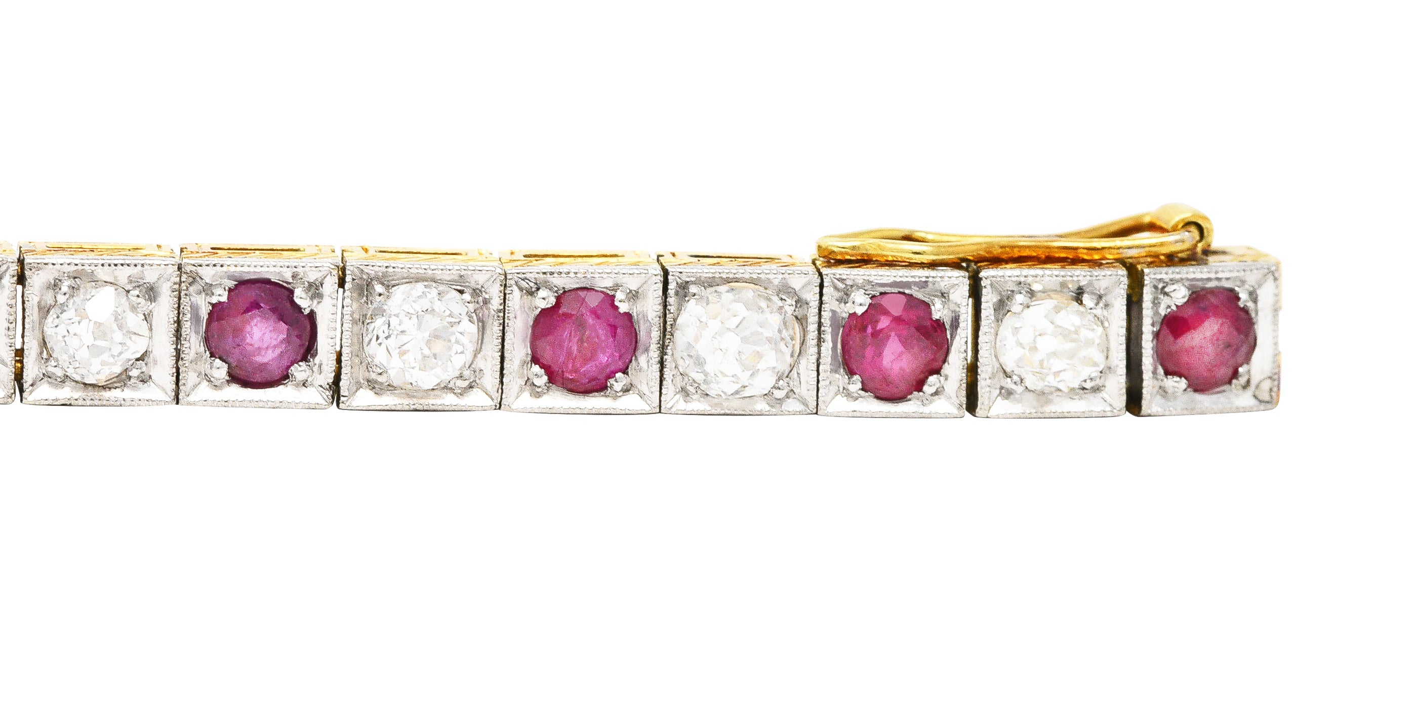 Edwardian 5.32 CTW Ruby Diamond Platinum-Topped 18 Karat Yellow Gold Milgrain Antique Line Bracelet Wilson's Estate Jewelry
