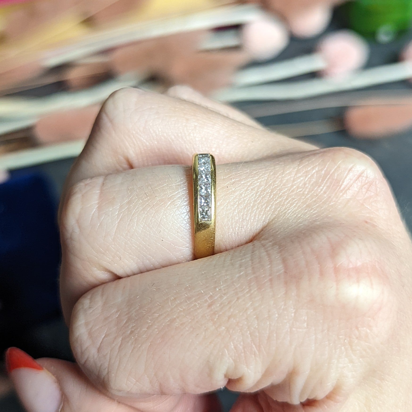 Tiffany & Co. 0.80 CTW Princess Diamond 18 Karat Yellow Gold Channel Band Ring Wilson's Estate Jewelry