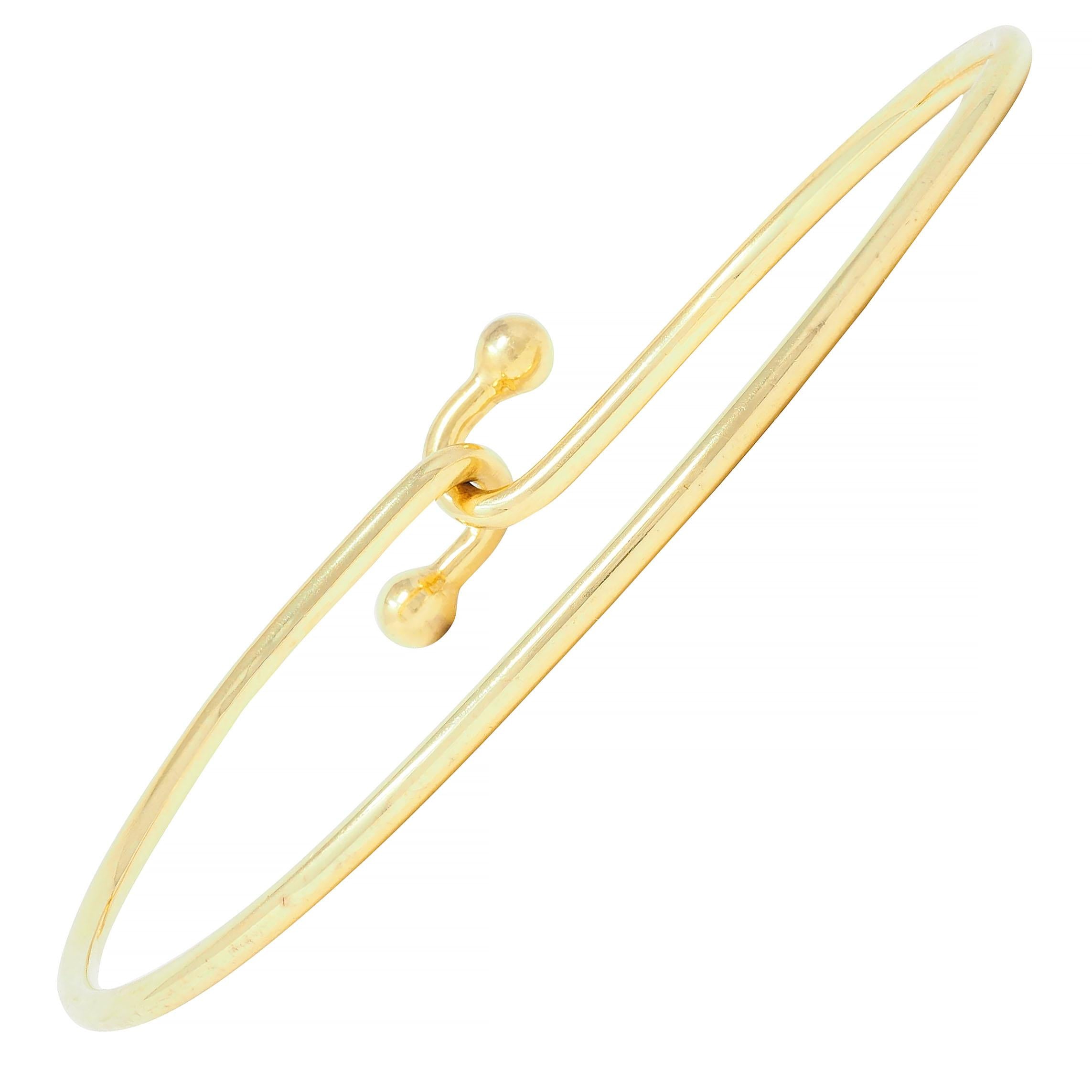 Tiffany & Co. 2000's 18 Karat Yellow Gold Interlocking Hook Bangle Bracelet