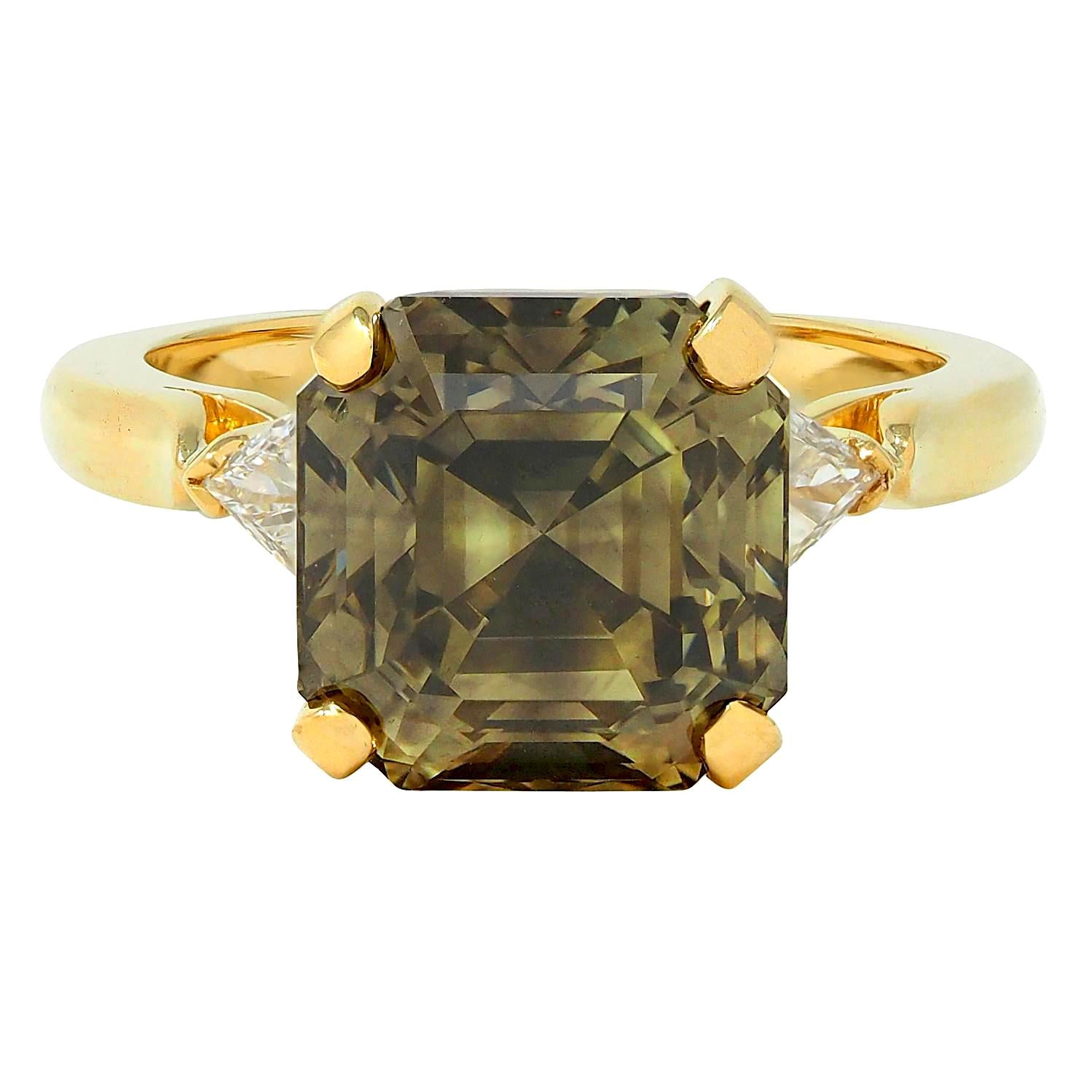 Van Cleef & Arpels 1990's 5.31 CTW Fancy Green Asscher Cut Diamond 18 Karat Yellow Gold Vintage Three Stone Ring