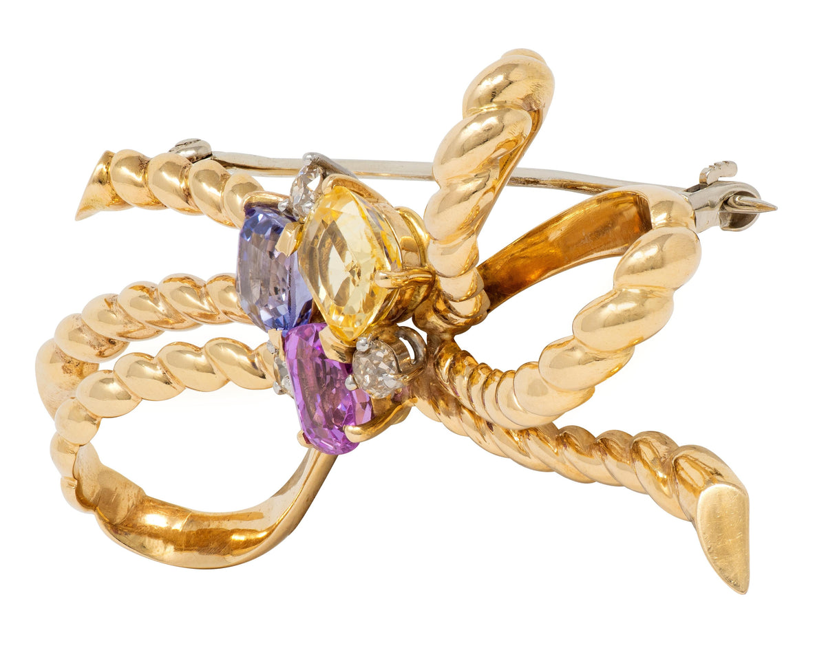 1960's Diamond Sapphire 14K Yellow Gold Platinum Vintage Twisted Bow Brooch