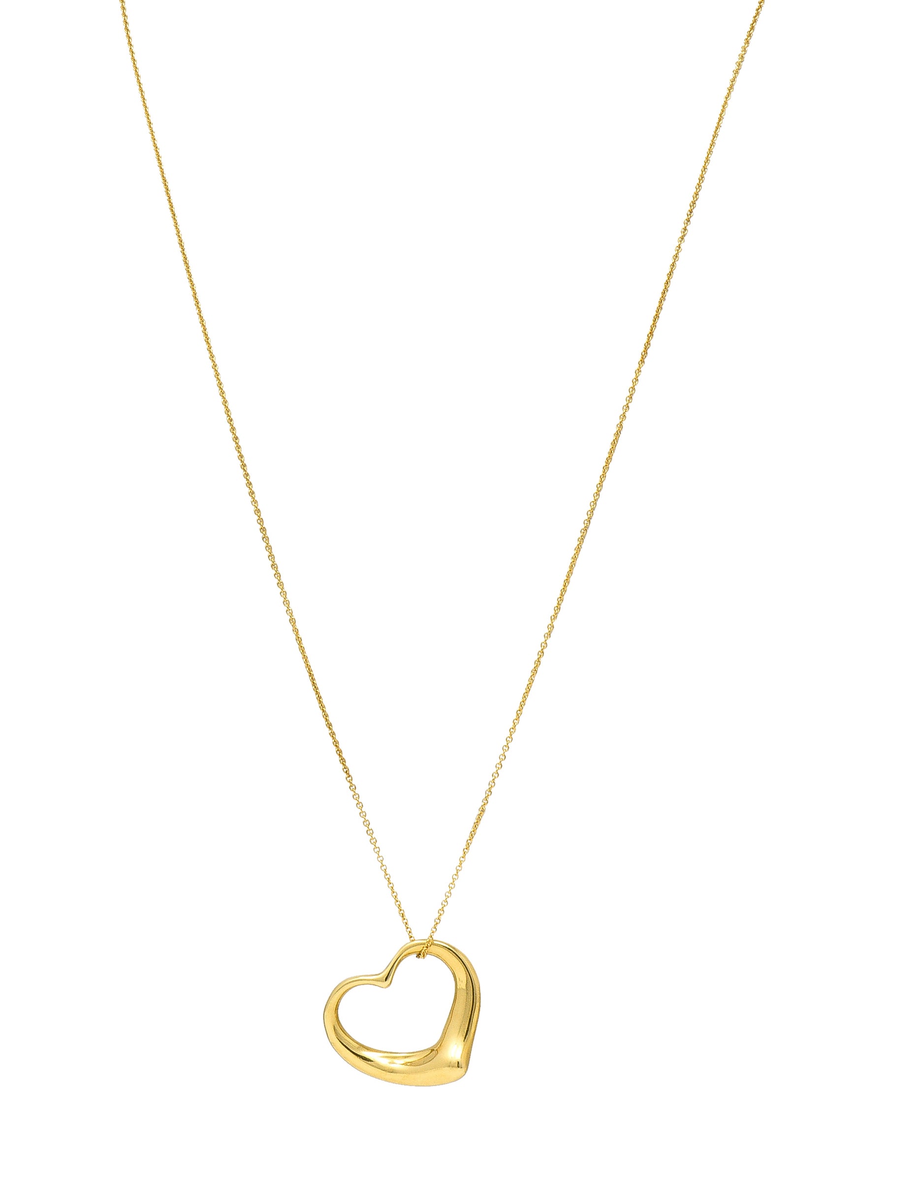 Elsa Peretti Tiffany & Co. 1990's 18 Karat Yellow Gold Open Heart Vintage Pendant Necklace Wilson's Estate Jewelry