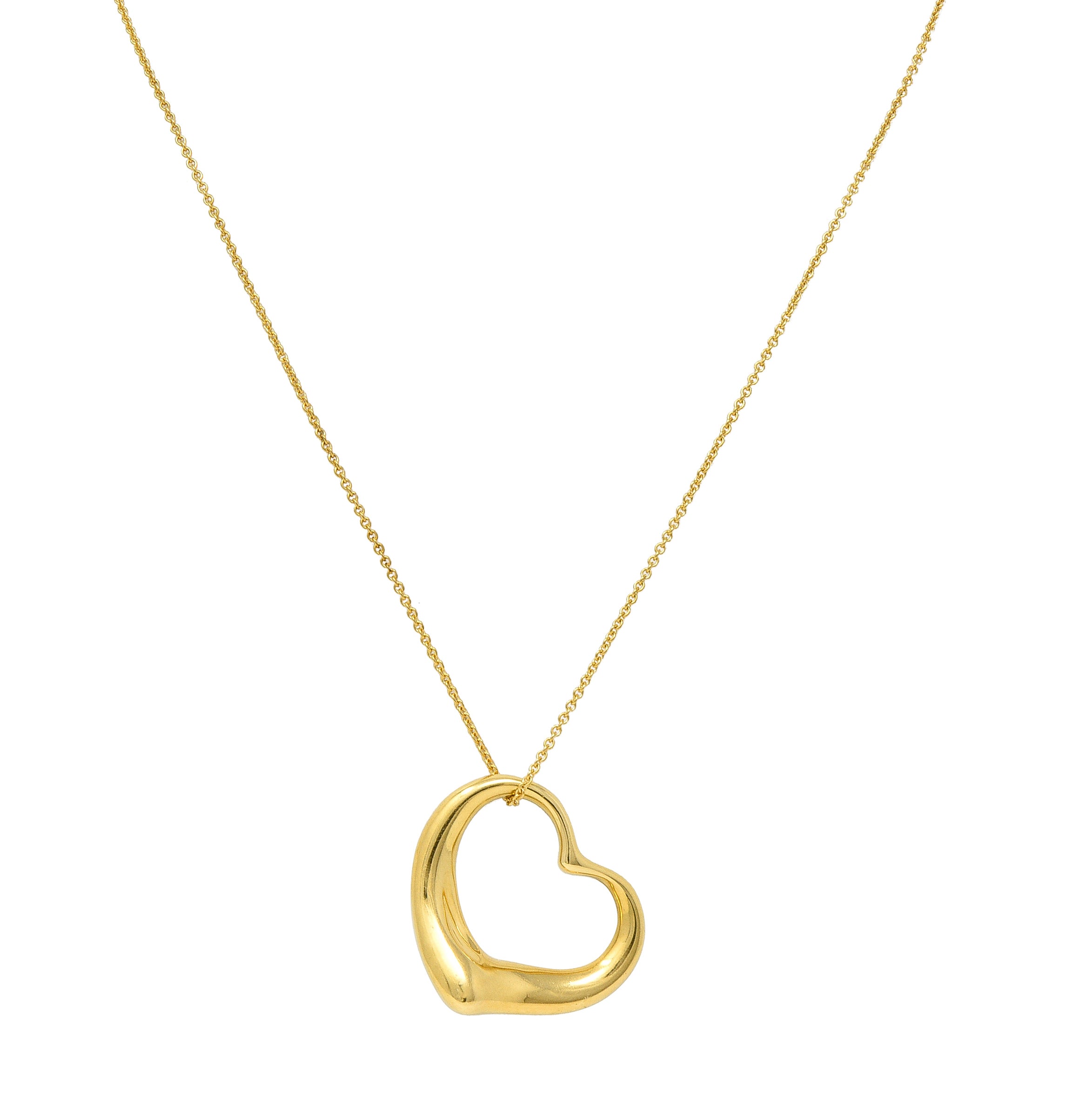 Elsa Peretti Tiffany & Co. 1990's 18 Karat Yellow Gold Open Heart Vintage Pendant Necklace Wilson's Estate Jewelry