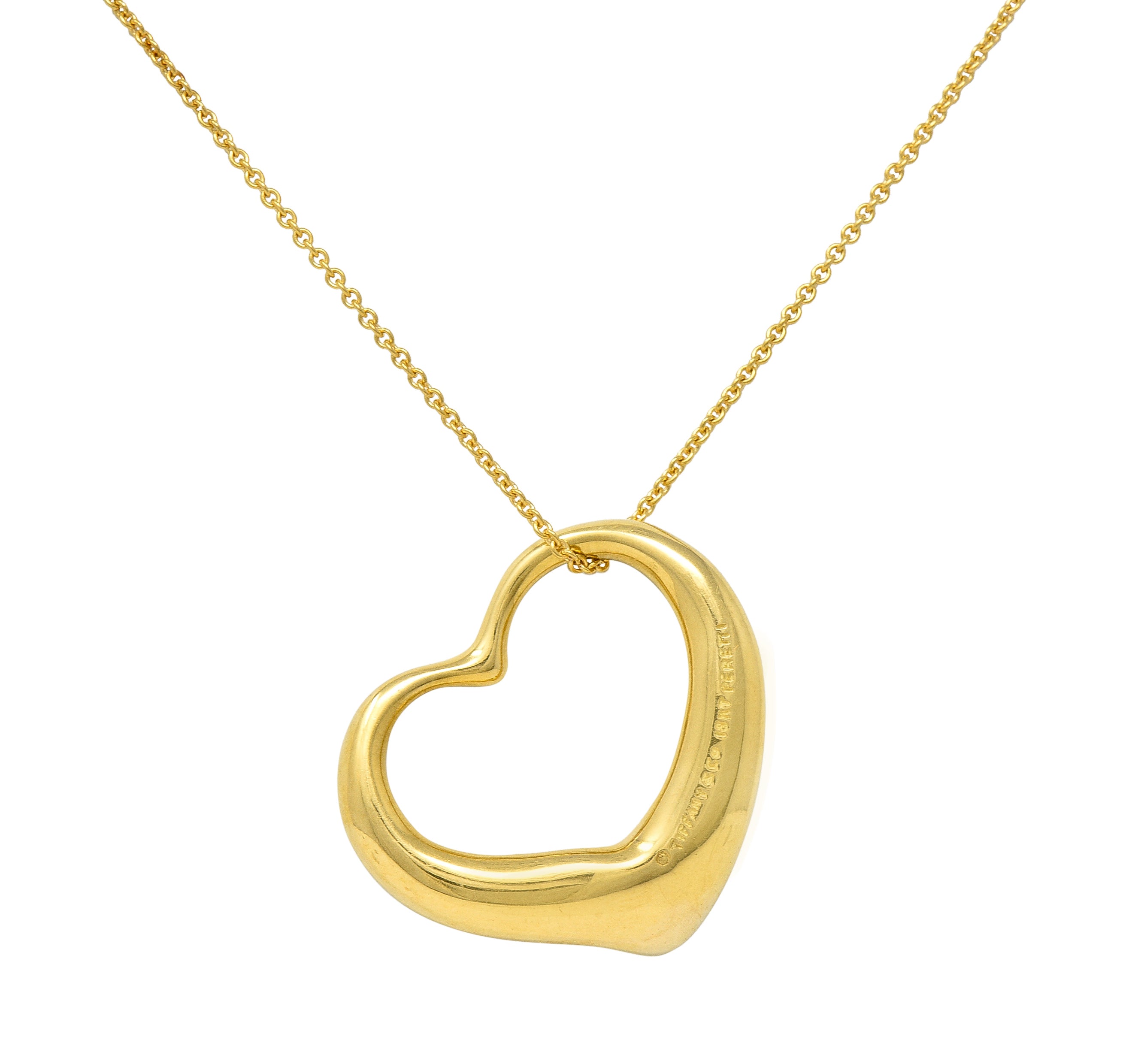 Elsa Peretti Tiffany & Co. 1990's 18 Karat Yellow Gold Open Heart Vintage Pendant Necklace Wilson's Estate Jewelry