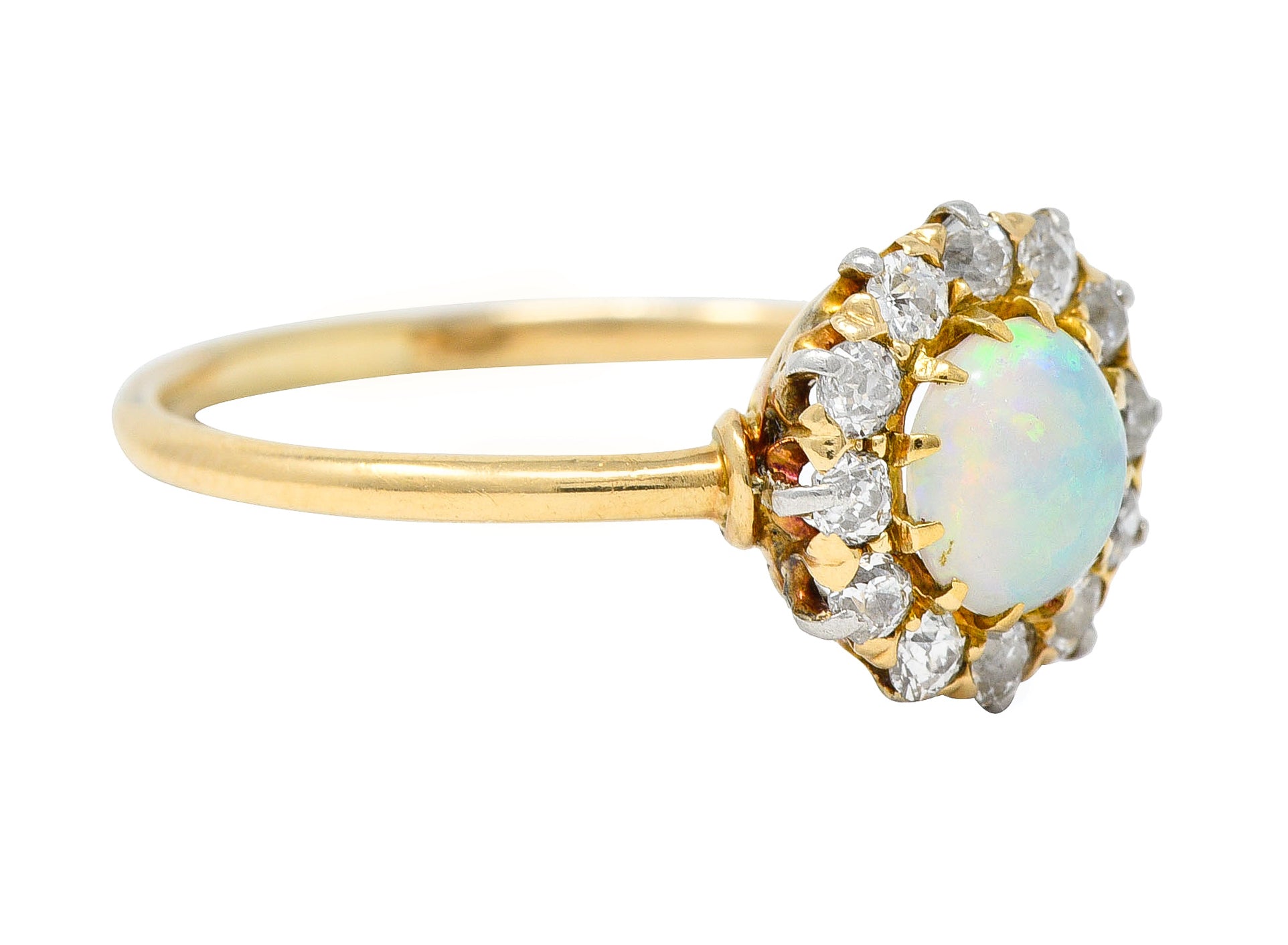 Edwardian Opal Cabochon Old European Cut Diamond Platinum-Topped 18 Karat Yellow Gold Antique Halo Ring Wilson's Estate Jewelry