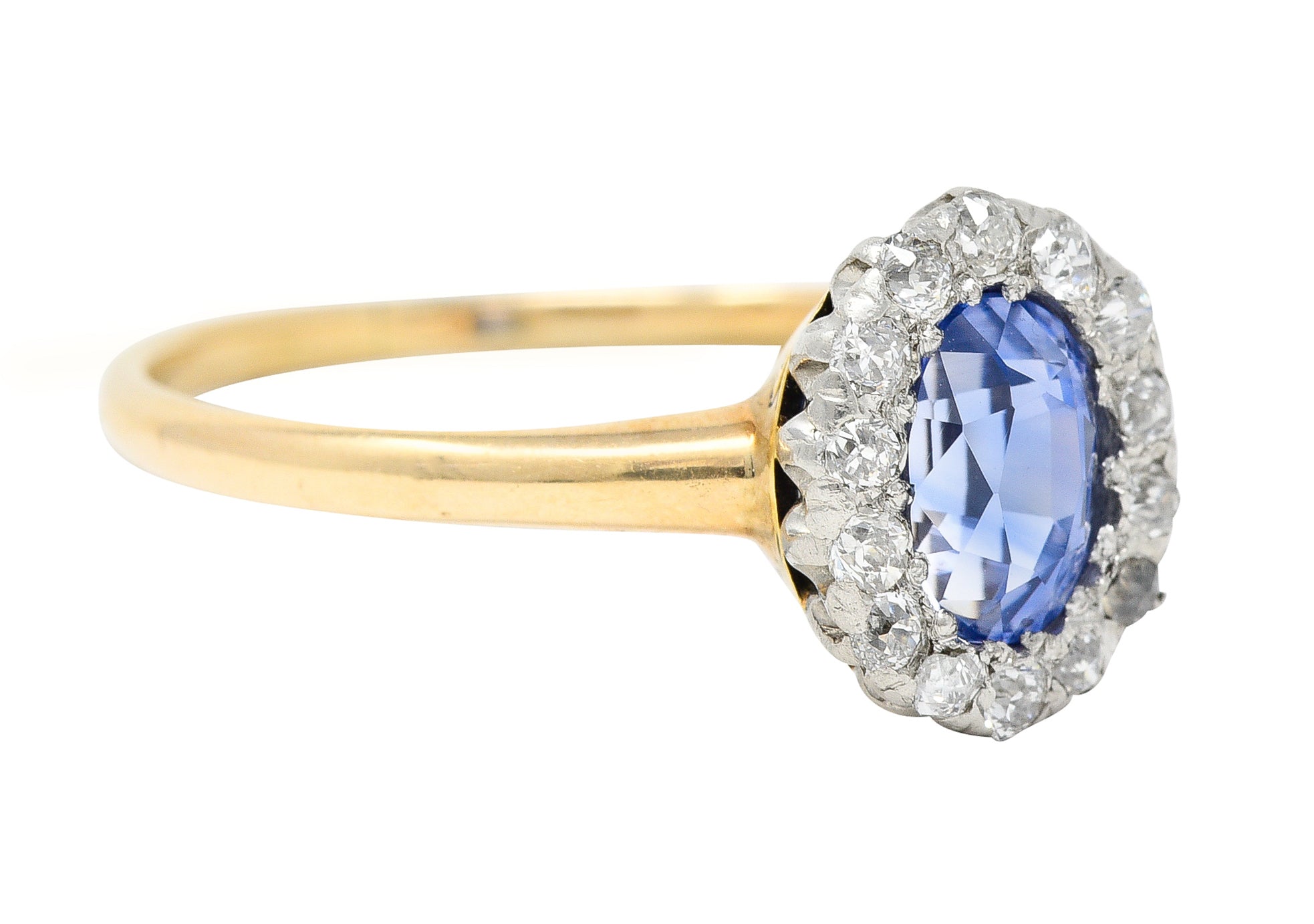 Edwardian 1.44 CTW Oval Cut Sapphire Diamond Platinum-Topped Antique Halo Ring Wilson's Estate Jewelry