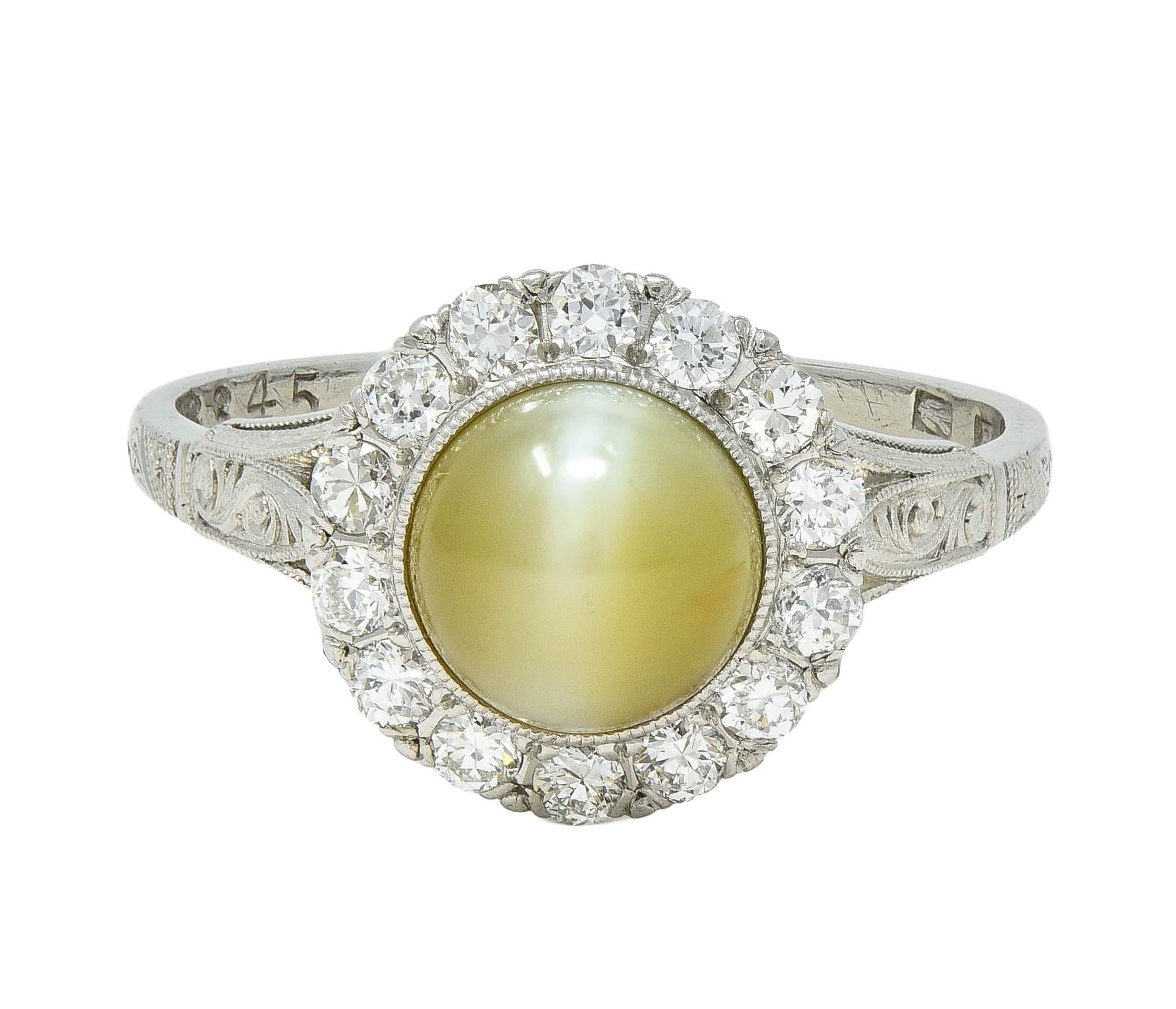 Late Art Deco 0.42 CTW Diamond Cat's Eye Chrysoberyl Platinum Vintage Halo Ring