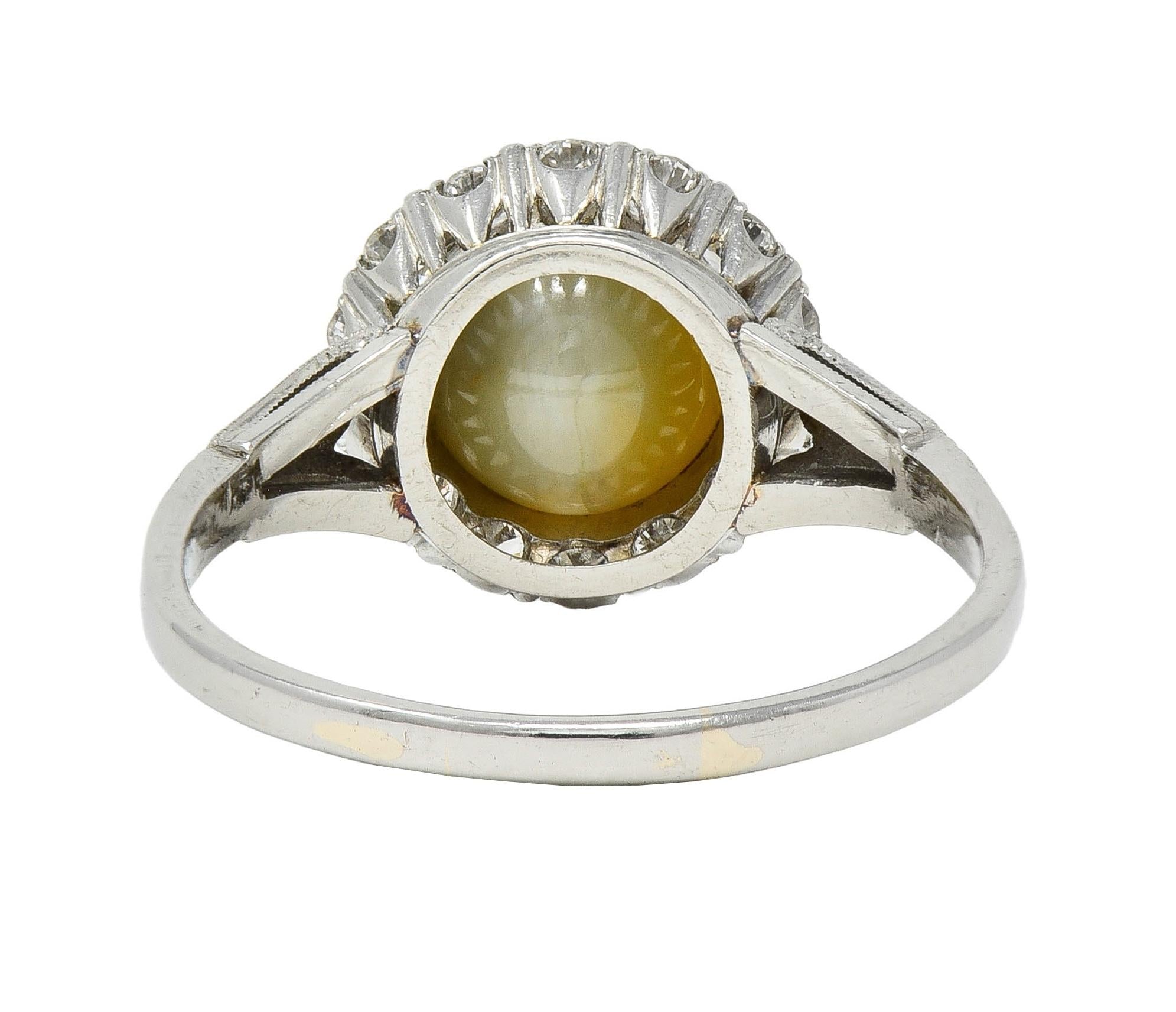 Late Art Deco 0.42 CTW Diamond Cat's Eye Chrysoberyl Platinum Vintage Halo Ring