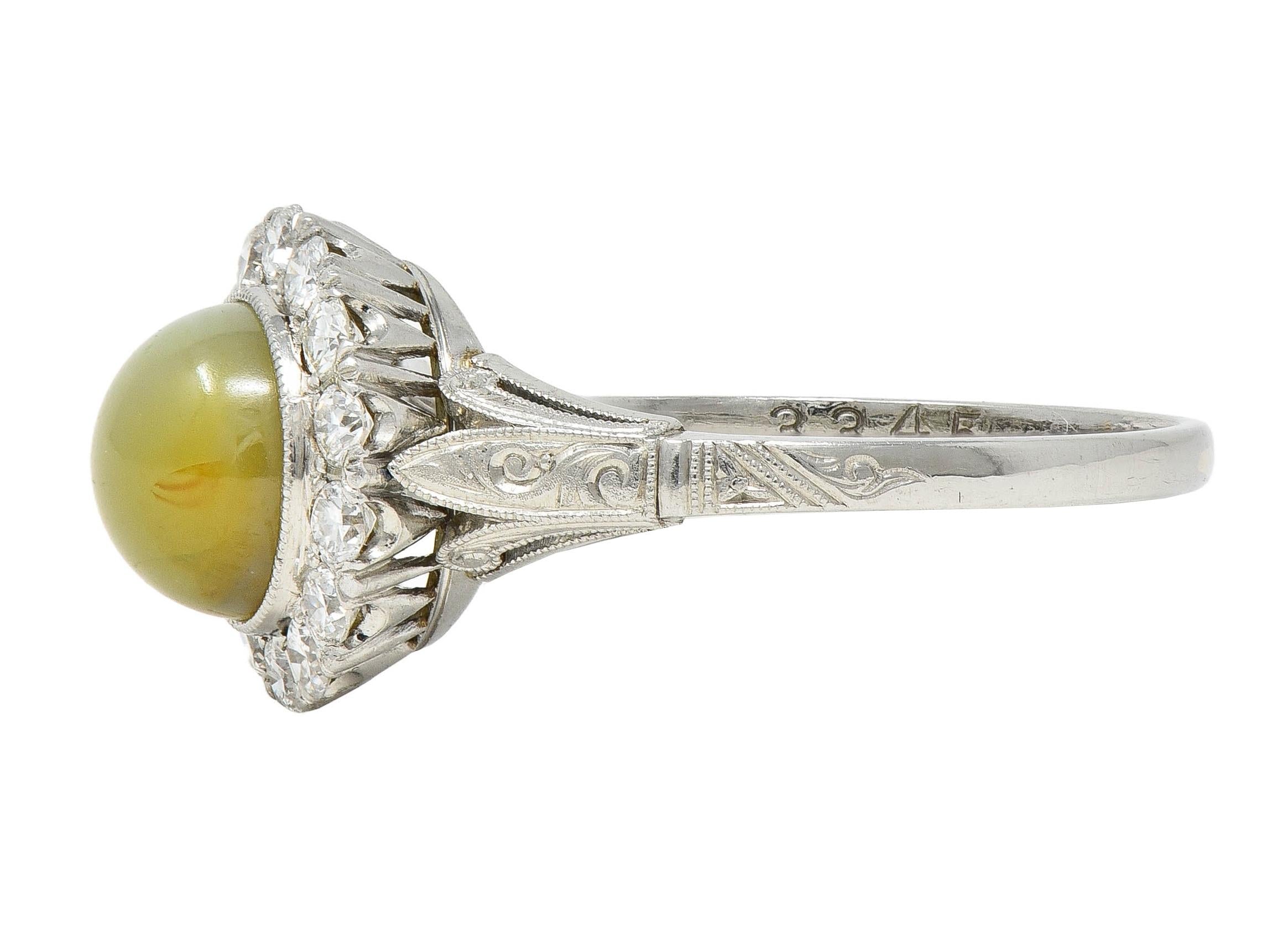 Late Art Deco 0.42 CTW Diamond Cat's Eye Chrysoberyl Platinum Vintage Halo Ring