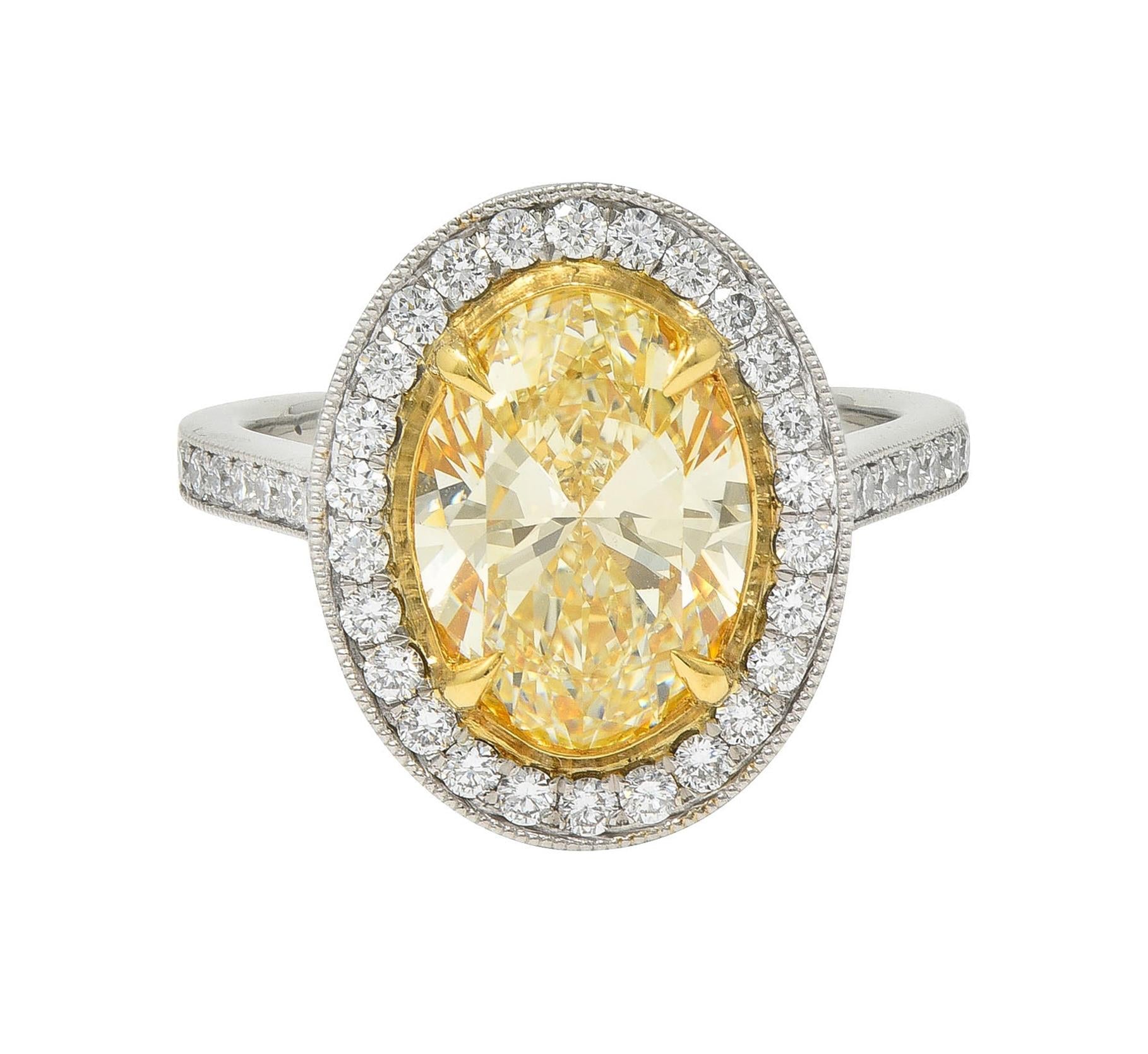 Contemporary 2.72 CTW Yellow Diamond Platinum 18 Karat Gold Halo Ring GIA