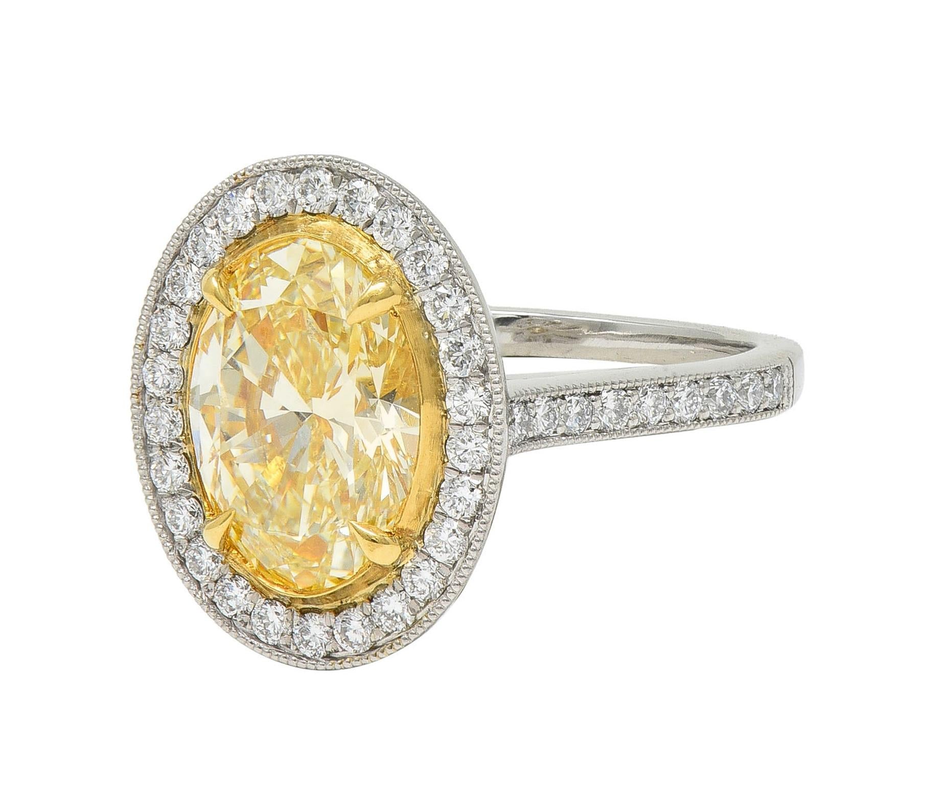 Contemporary 2.72 CTW Yellow Diamond Platinum 18 Karat Gold Halo Ring GIA