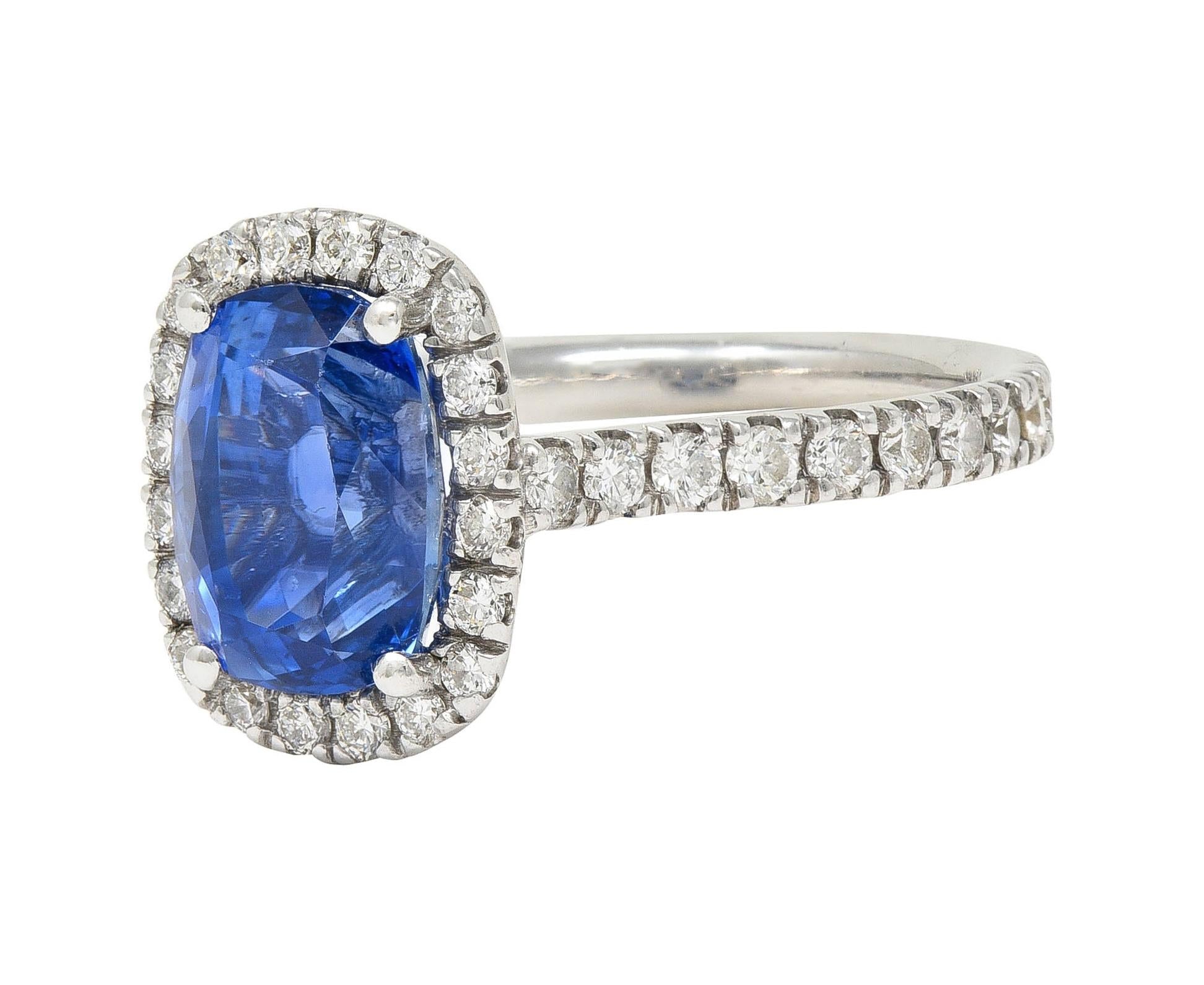 Contemporary 4.67 CTW Sapphire Diamond 18 Karat White Gold Halo Ring