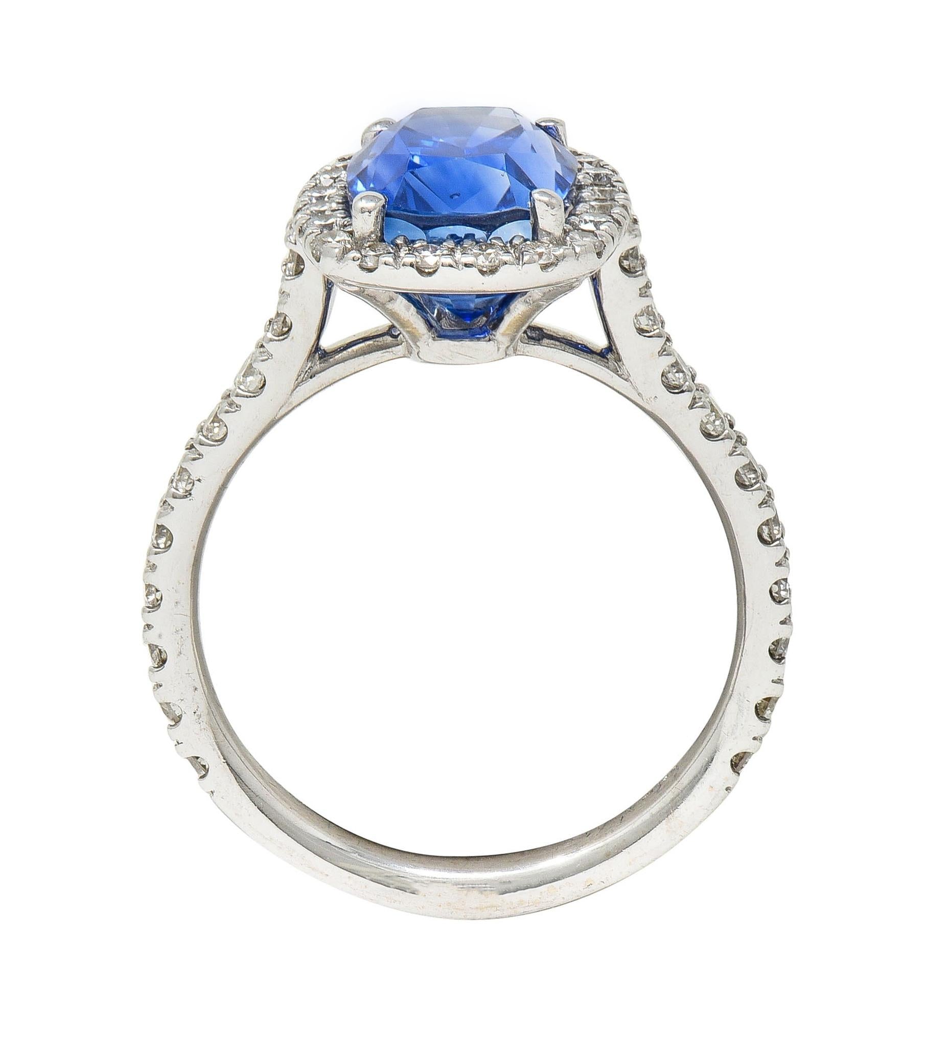 Contemporary 4.67 CTW Sapphire Diamond 18 Karat White Gold Halo Ring