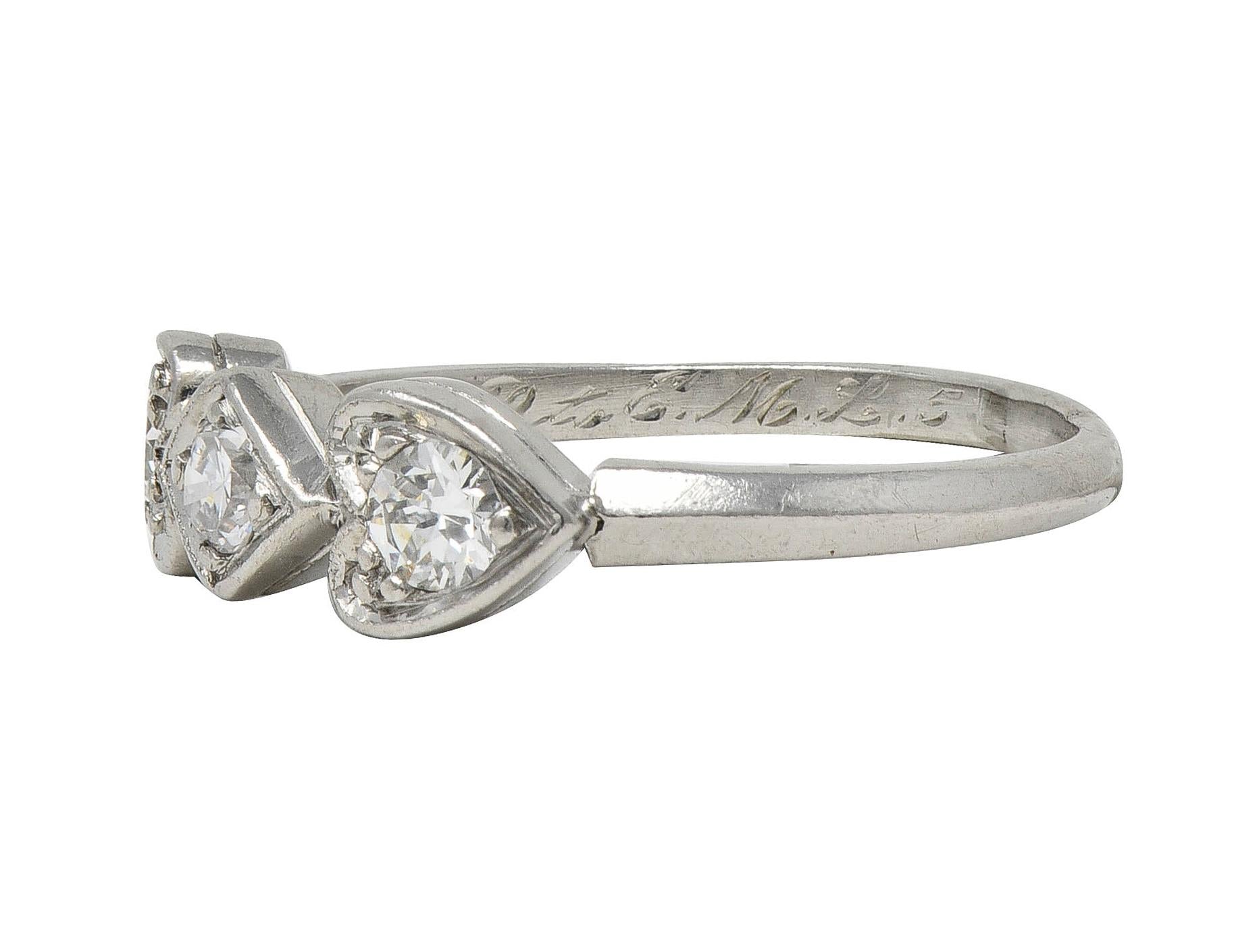 Mid-Century 0.32 CTW Diamond Platinum Heart Three Stone Vintage Band Ring