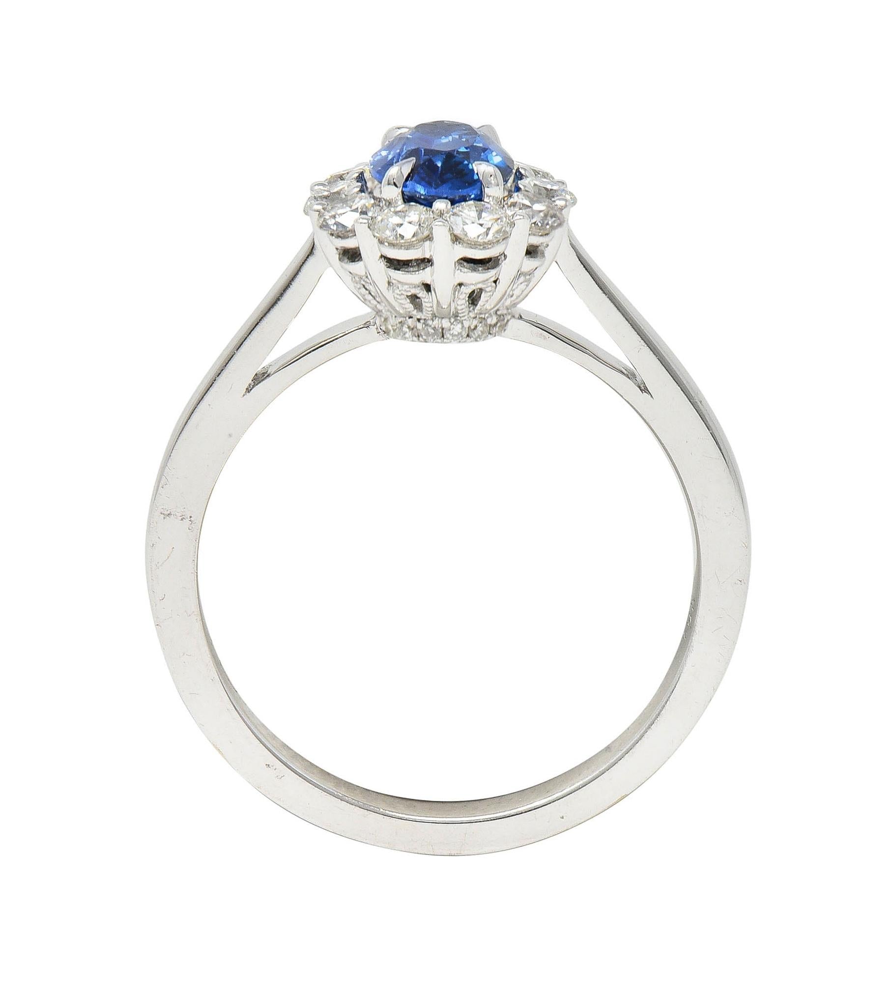 Contemporary 1.63 CTW Sapphire Diamond 18 Karat White Gold Halo Ring