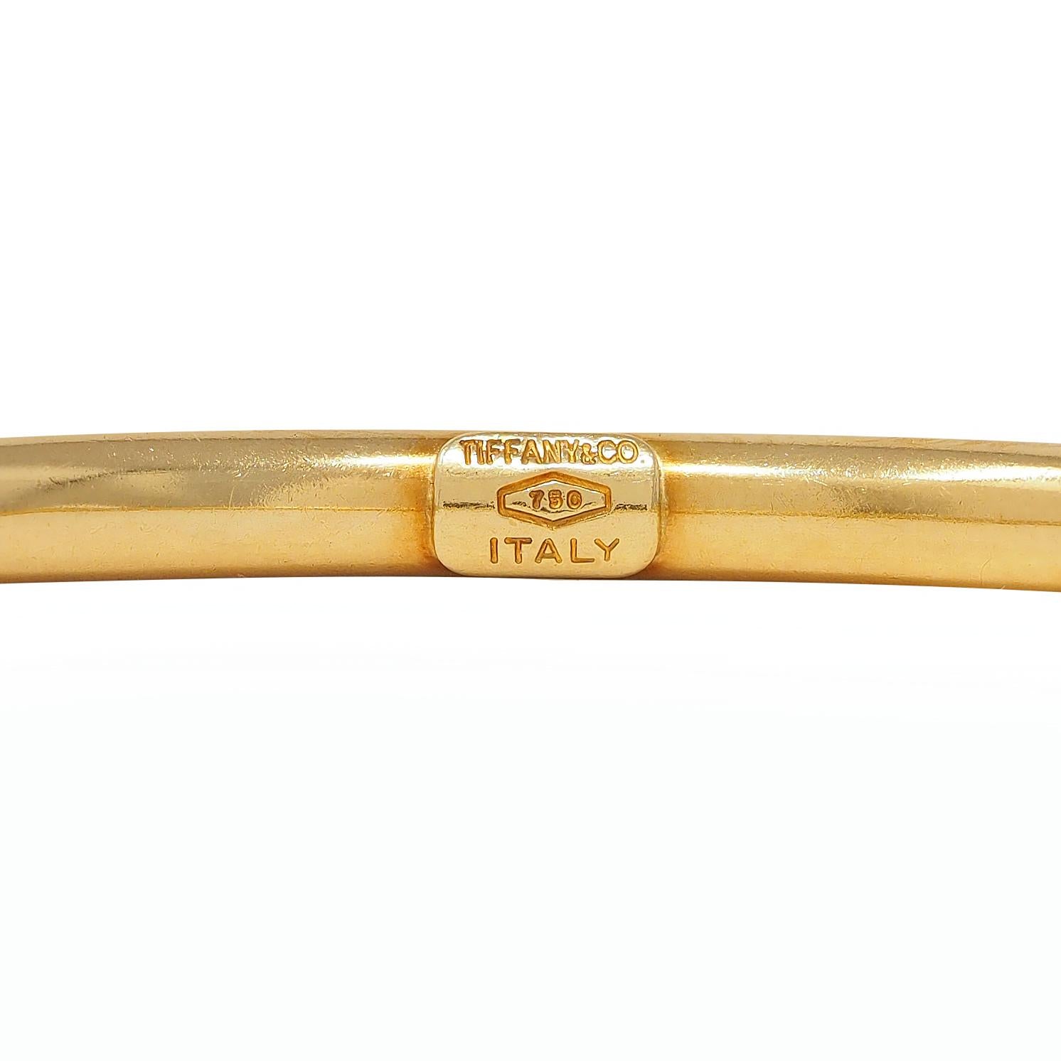 Tiffany & Co. 1990's 18 Karat Yellow Gold Vintage Oval Bangle Bracelet