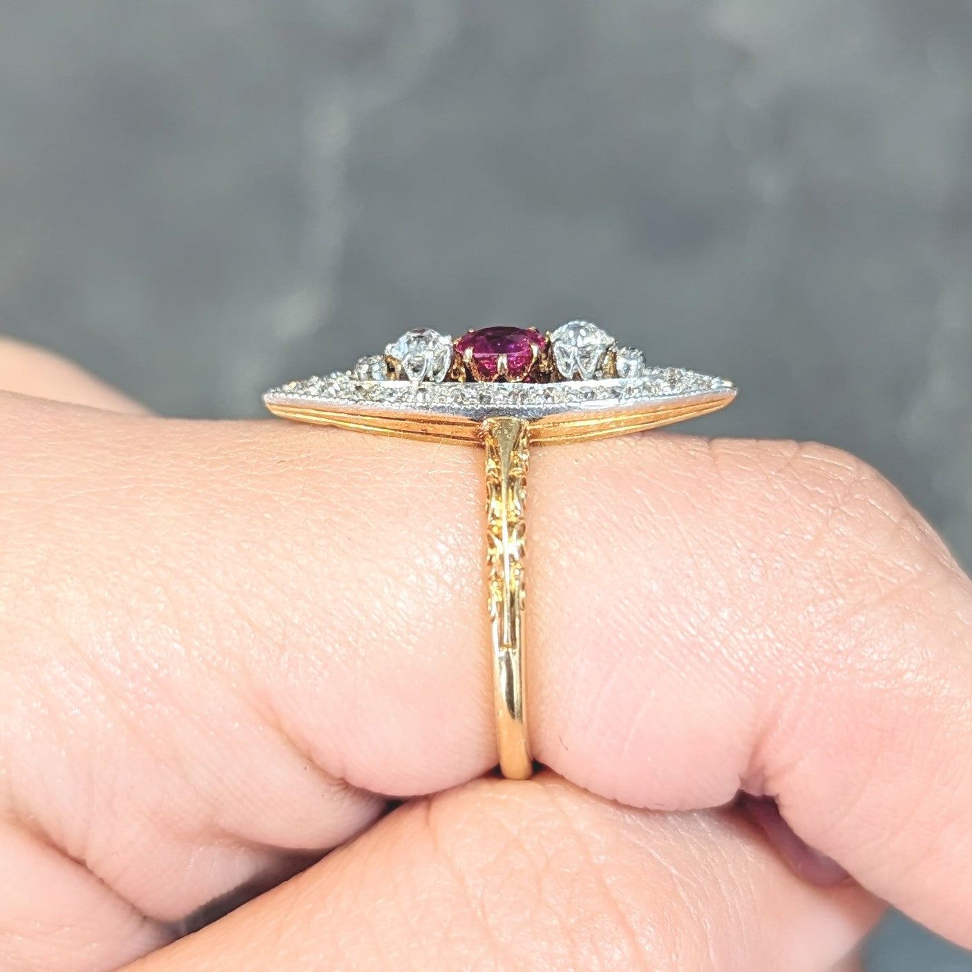 Edwardian 0.62 CTW Ruby Diamond Platinum 18 Karat Yellow Gold Scroll Antique Navette Ring Wilson's Estate Jewelry