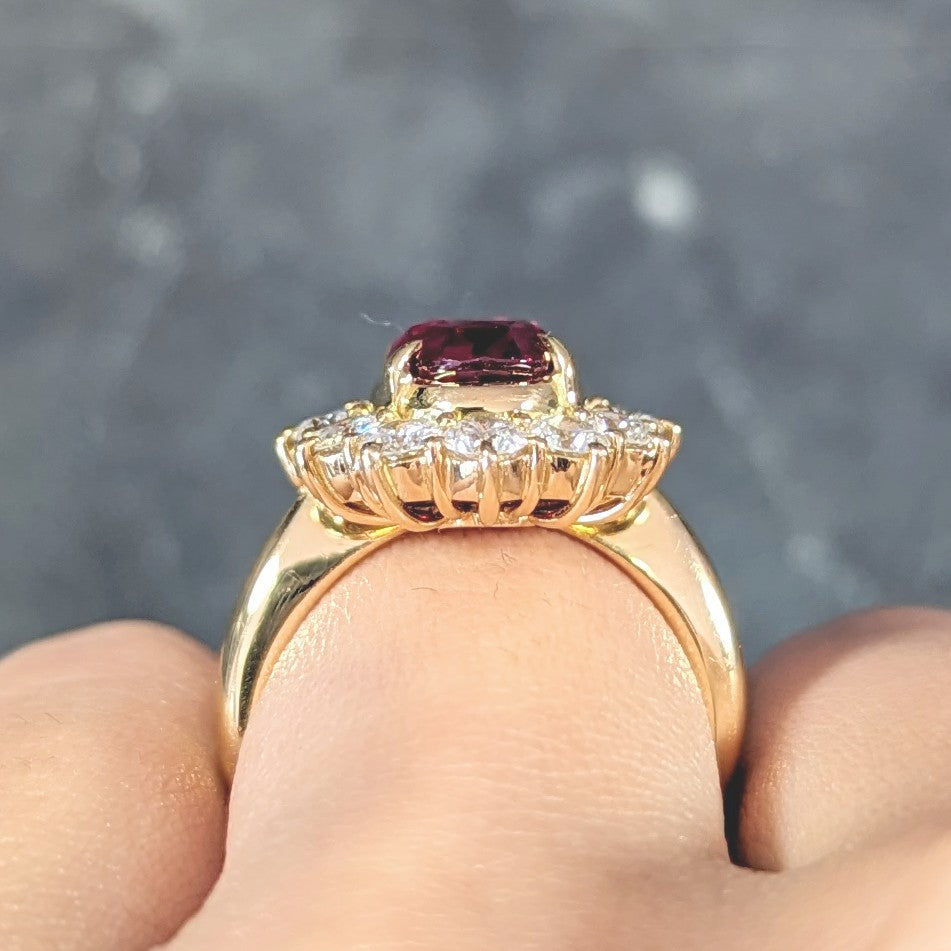 Contemporary 4.28 CTW Oval Step Cut Ruby Diamond 18 Karat Yellow Gold Halo Ring GIA Wilson's Estate Jewelry