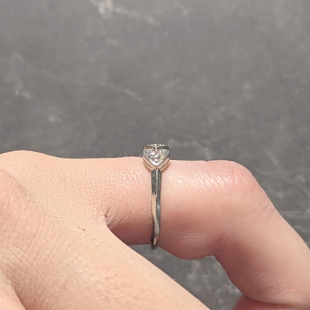 Mid-Century 0.32 CTW Diamond Platinum Heart Three Stone Vintage Band Ring