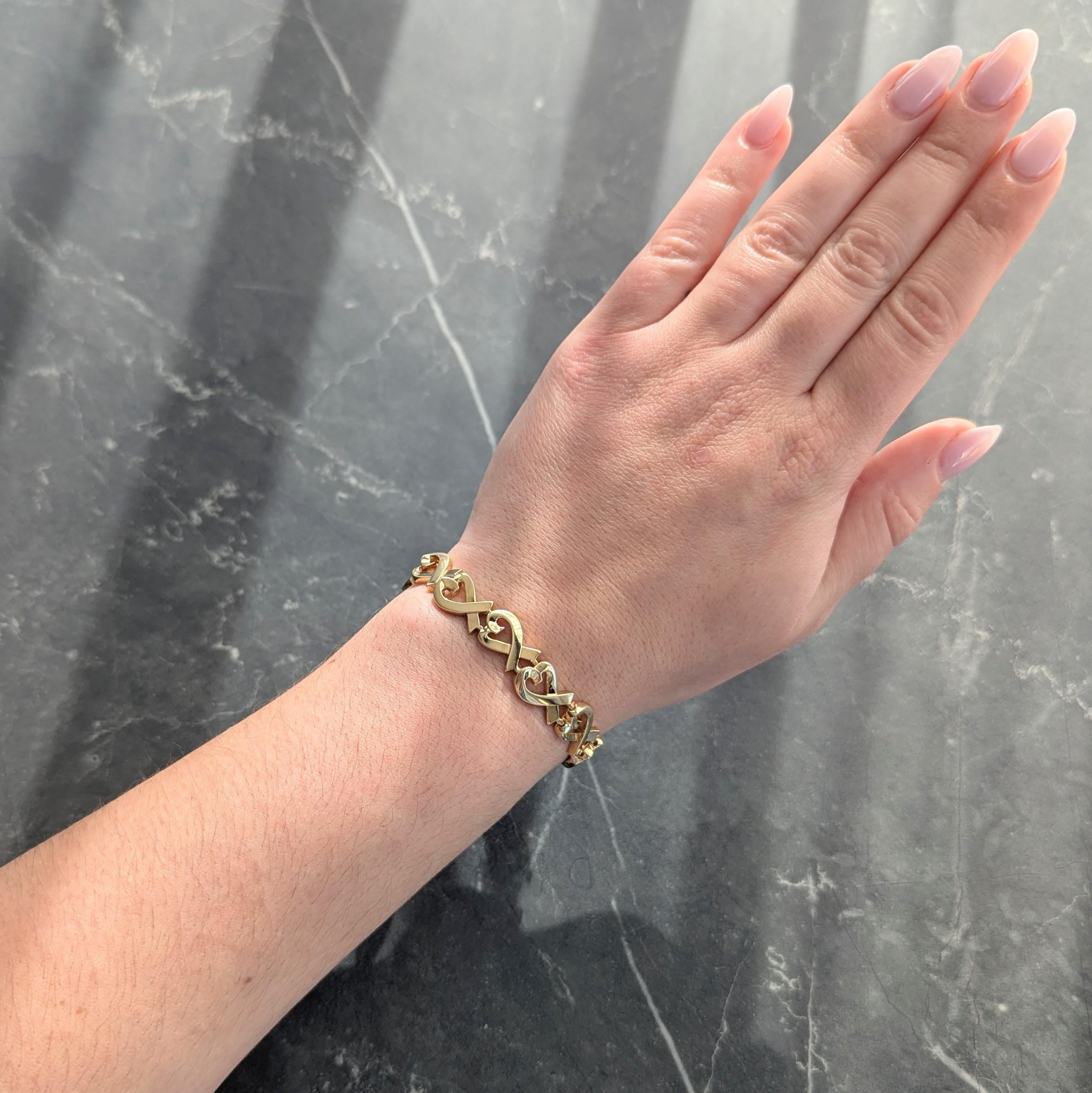 Tiffany & Co. Paloma Picasso 1980's 18K Gold Vintage Loving Hearts Bracelet