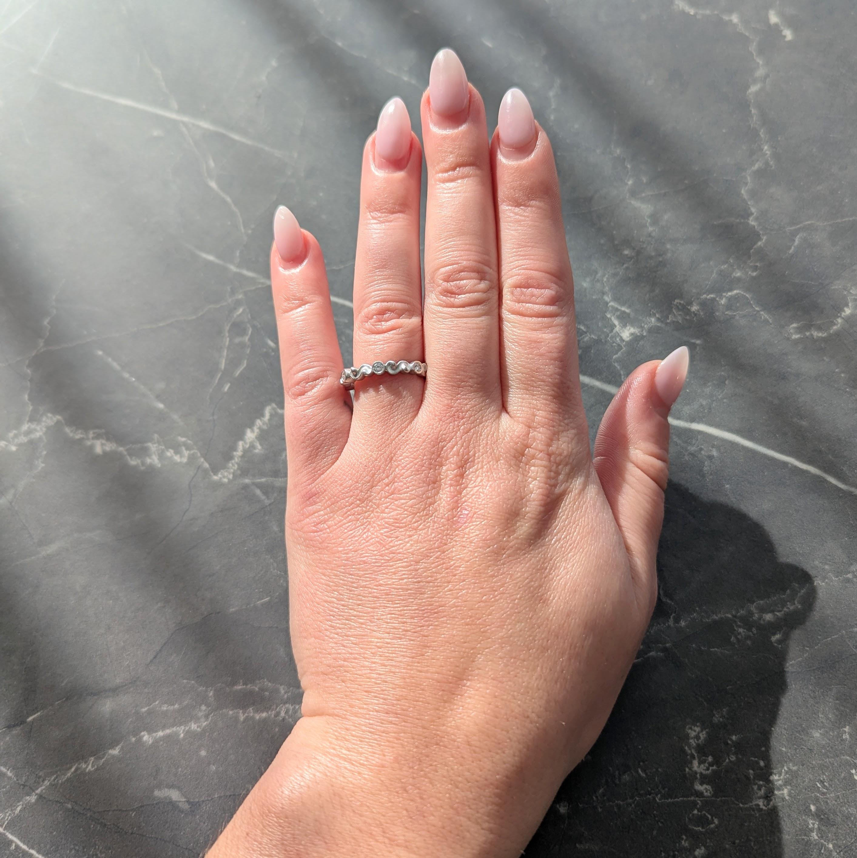 1990's Diamond 14 Karat White Gold Vintage Scrolling Bezel Band Ring