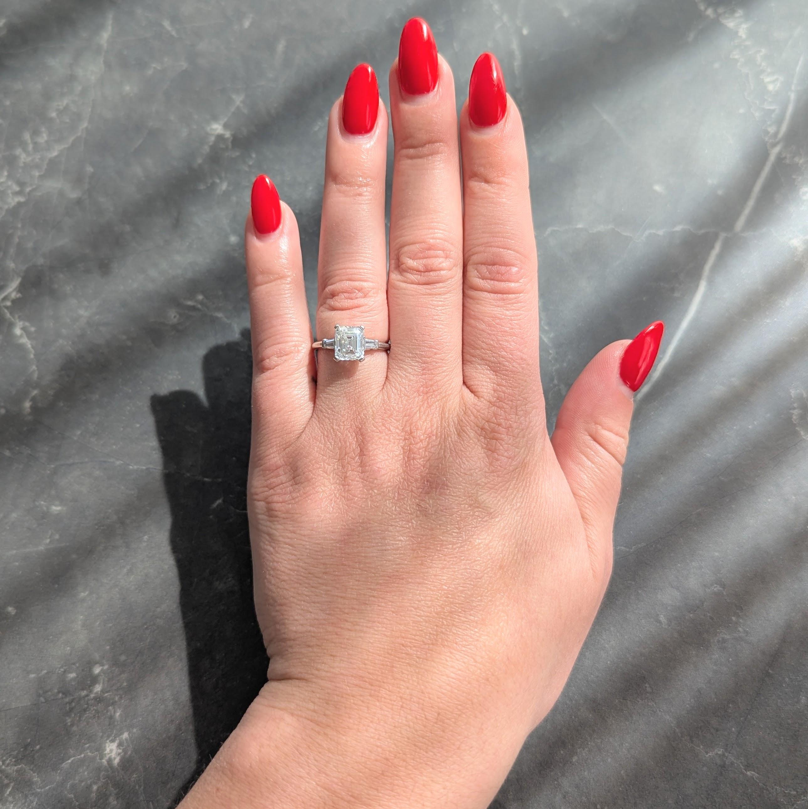 Mid-Century Emerald Cut Diamond Platinum Three Stone Vintage Engagement Ring