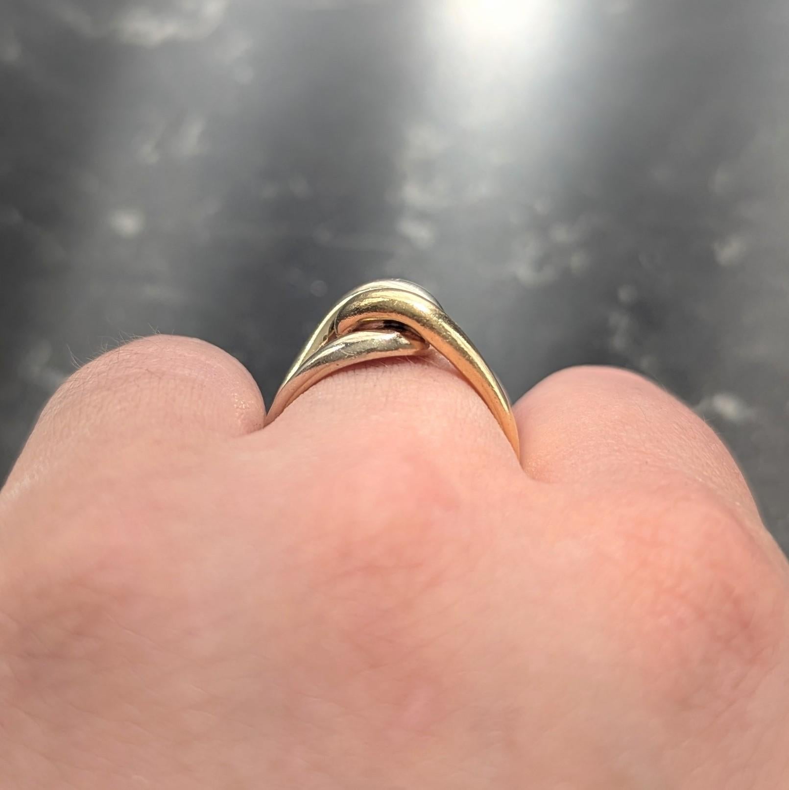 Cartier 1970's 18 Karat Two-Tone Yellow White Gold Vintage locking Loop Ring