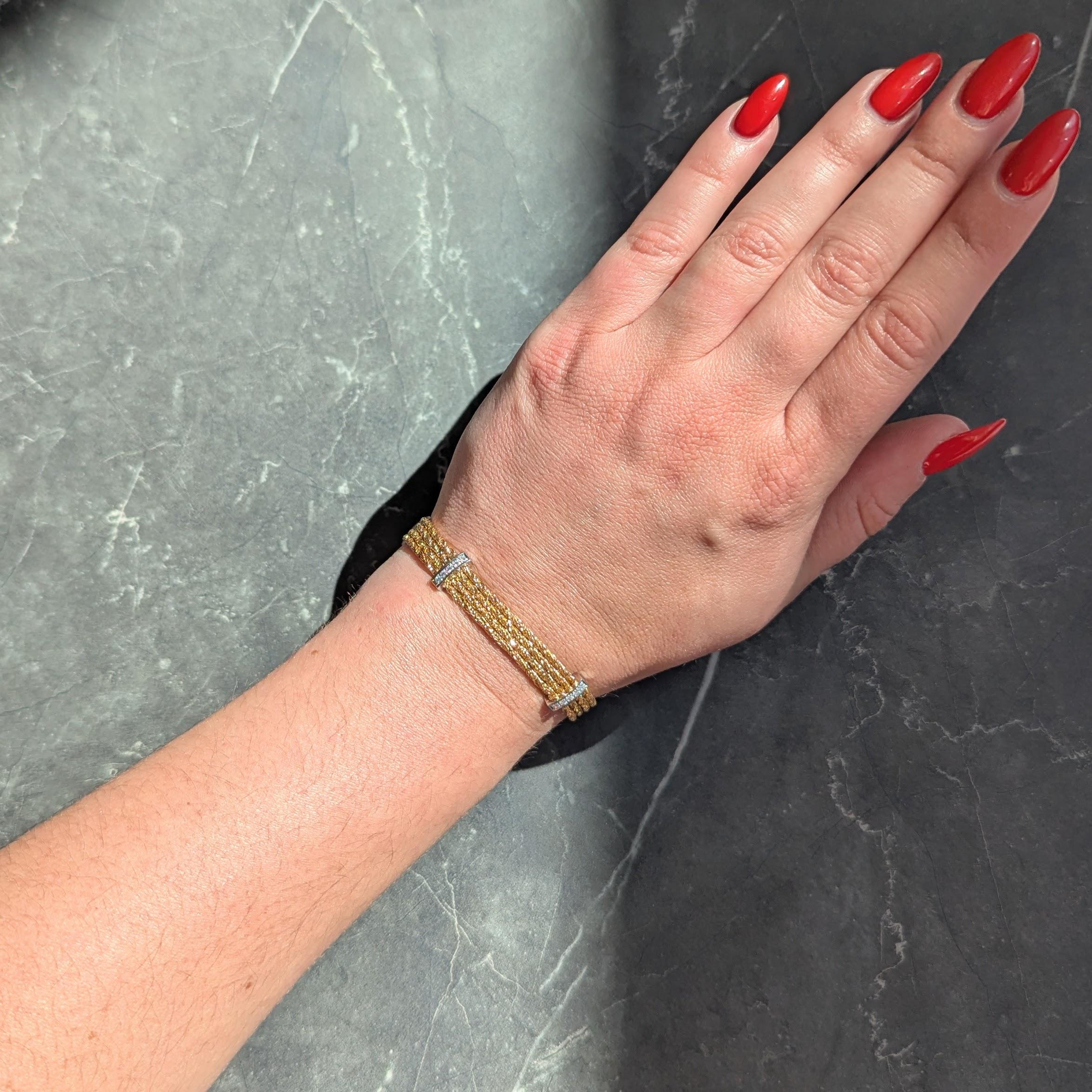 Tiffany & Co. 1990's Diamond 18K Yellow Gold Platinum Vintage Strand Bracelet