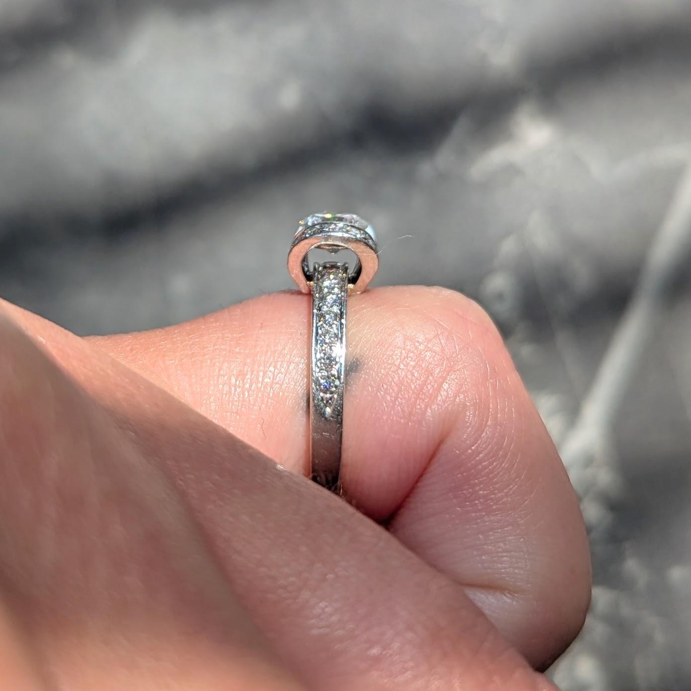 Tiffany & Co. 2000's Round Brilliant Cut Diamond Platinum Ribbon Engagement Ring