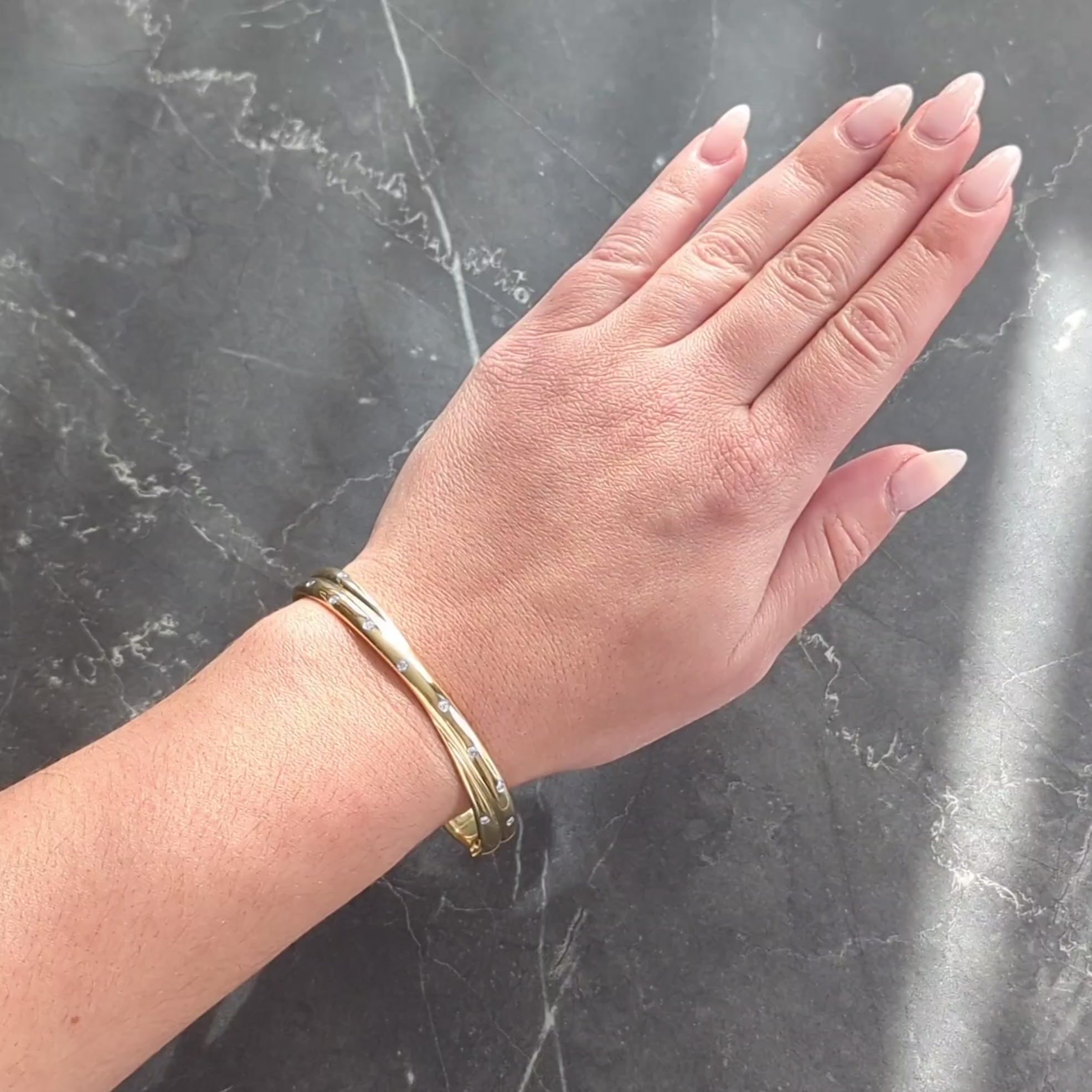 Tiffany & Co. 1990's Diamond 18 Karat Yellow Gold Vintage Etoile Bangle Bracelet