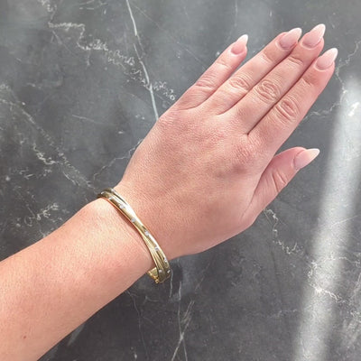 Tiffany & Co. 1990's Diamond 18 Karat Yellow Gold Vintage Etoile Bangle Bracelet