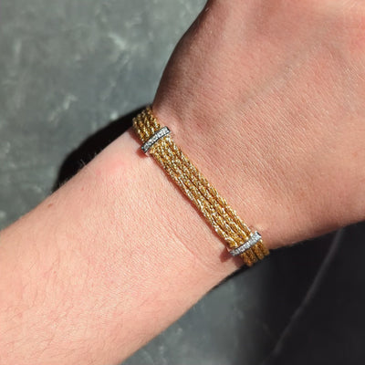 Tiffany & Co. 1990's Diamond 18K Yellow Gold Platinum Vintage Strand Bracelet
