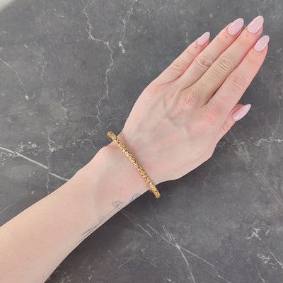 Sloan & Co. Late Victorian 14K Gold Ornamental Floral Antique Bangle Bracelet