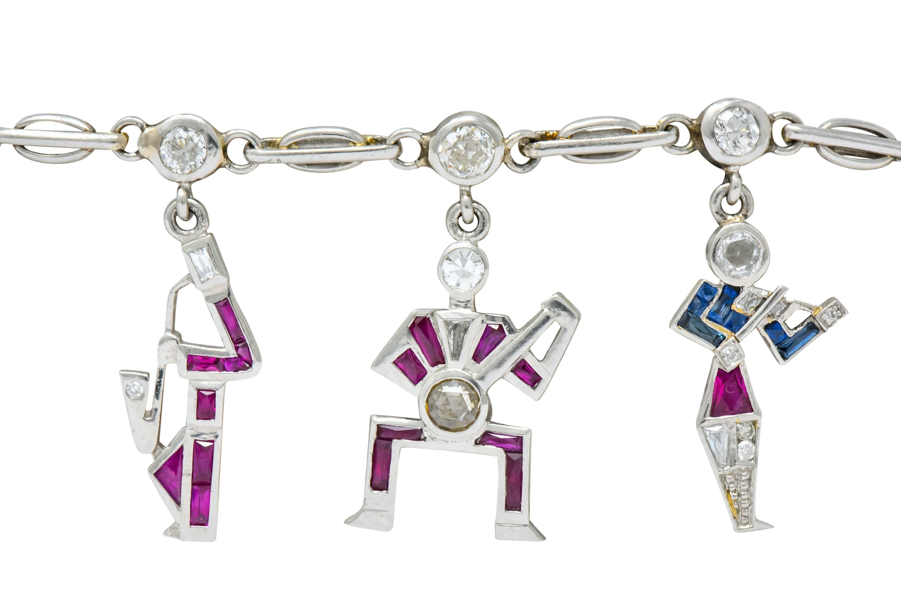 Retro Diamond Ruby Sapphire Platinum Jazz Band Musical Charm Bracelet Circa 1940s - Wilson's Estate Jewelry