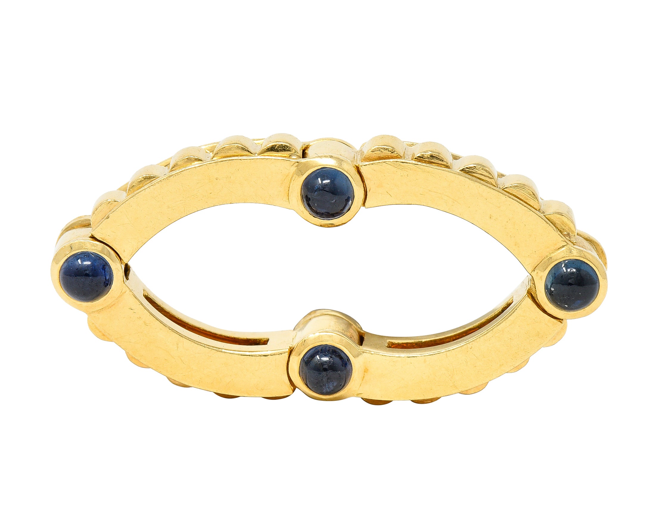 Bulgari 1990s 1.12 CTW Sapphire Cabochon 18 Karat Gold Hinged Vintage Band Ring Wilson's Estate Jewelry