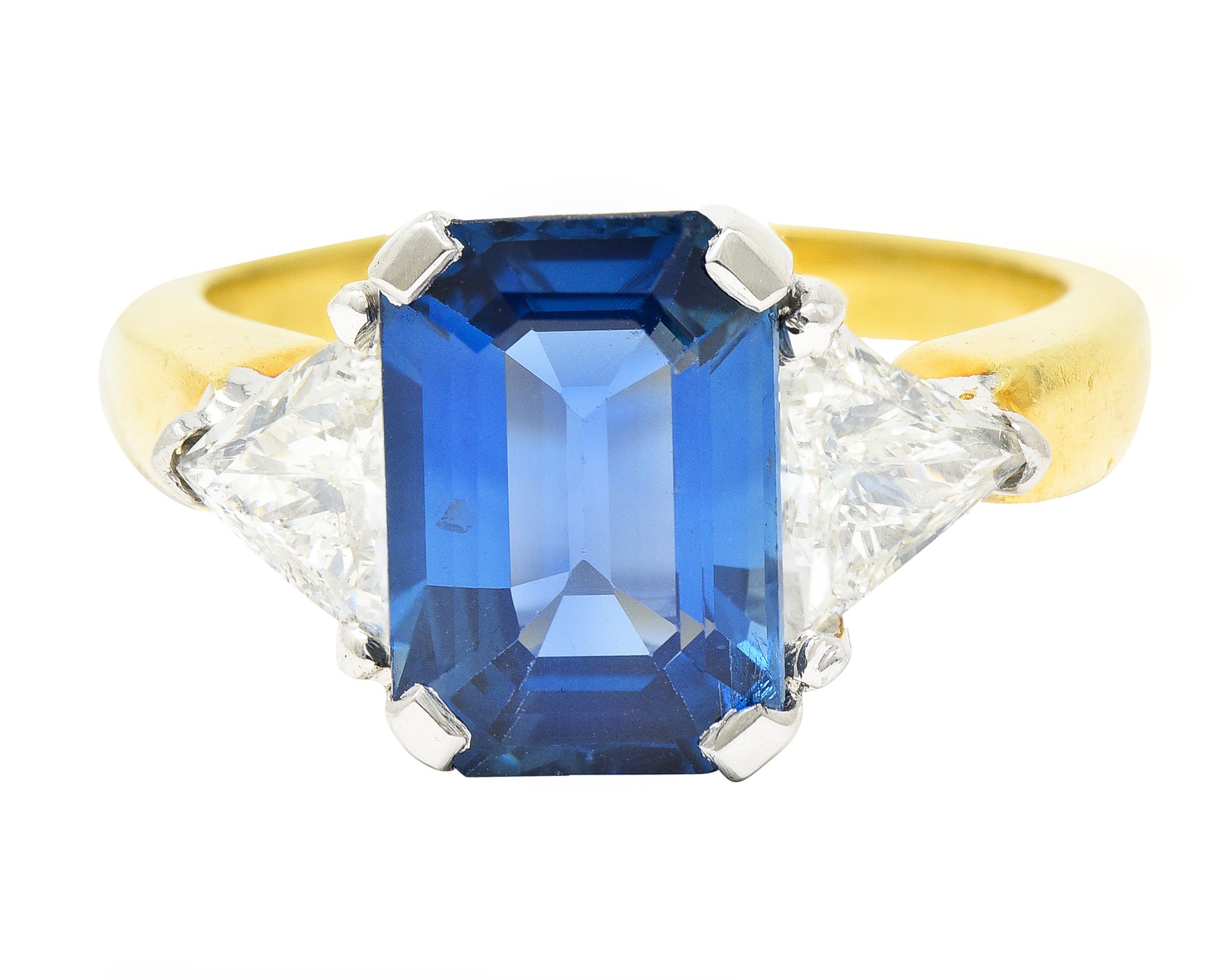 .11111 ## IS THIS A BETTER EDIT?SL 1980's 4.00 CTW Emerald Cut Sapphire Trillion Cut Diamond Platinum 18 Karat Yellow Gold Vintage Three Stone Ring Wilson's Estate Jewelry