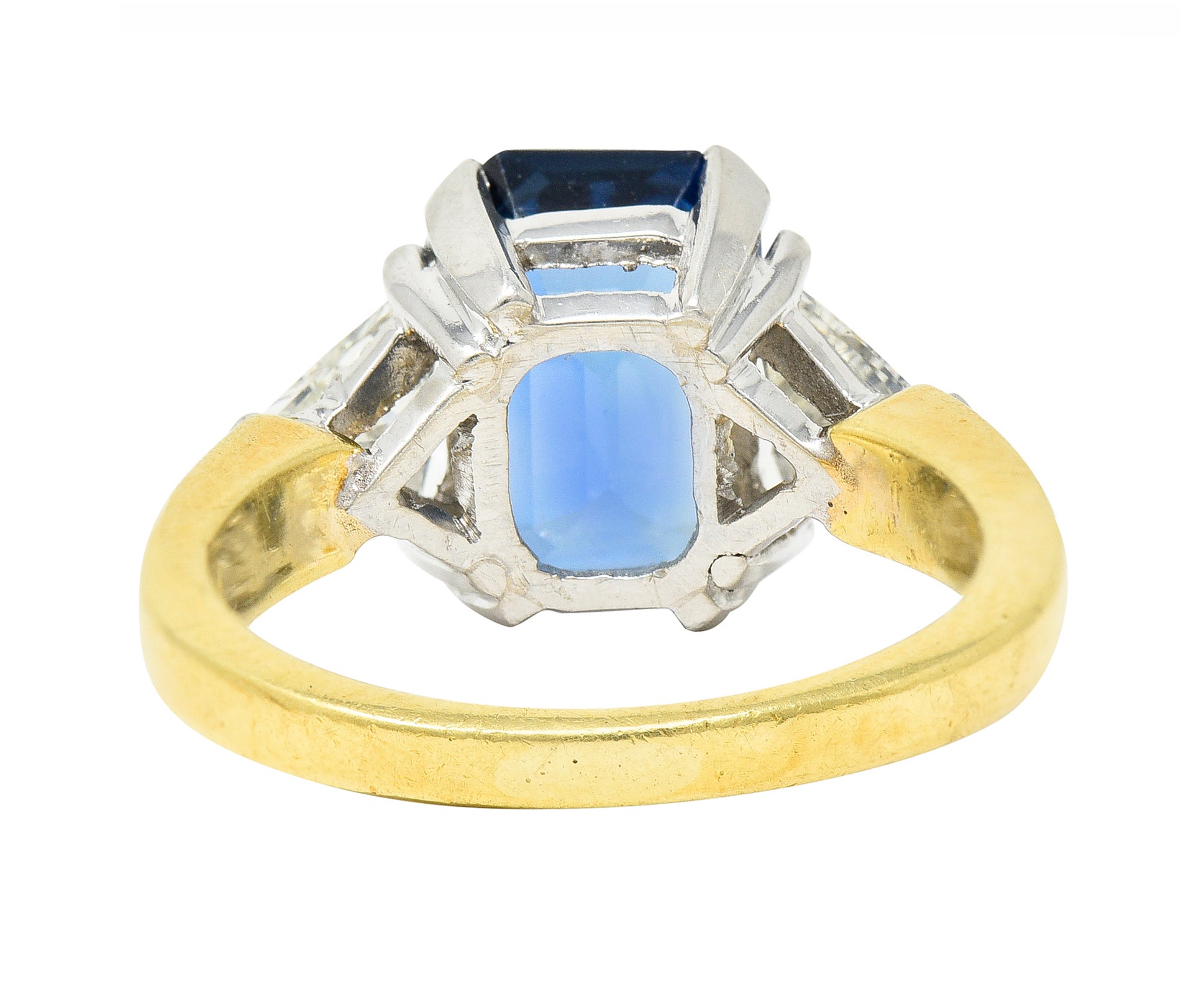 .11111 ## IS THIS A BETTER EDIT?SL 1980's 4.00 CTW Emerald Cut Sapphire Trillion Cut Diamond Platinum 18 Karat Yellow Gold Vintage Three Stone Ring Wilson's Estate Jewelry