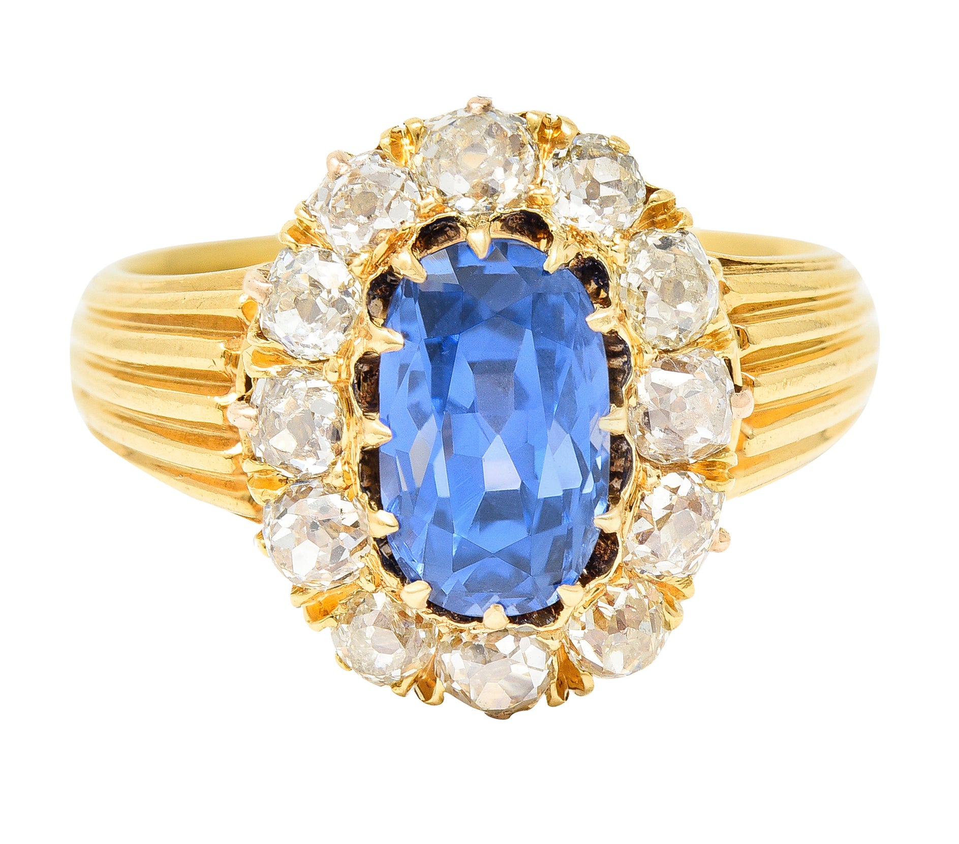 1867 Victorian 4.16 CTW Oval Cut No Heat Ceylon Sapphire Old Mine Cut Diamond 18 Karat Yellow Gold Antique Halo Ring GIA Wilson's Estate Jewelry