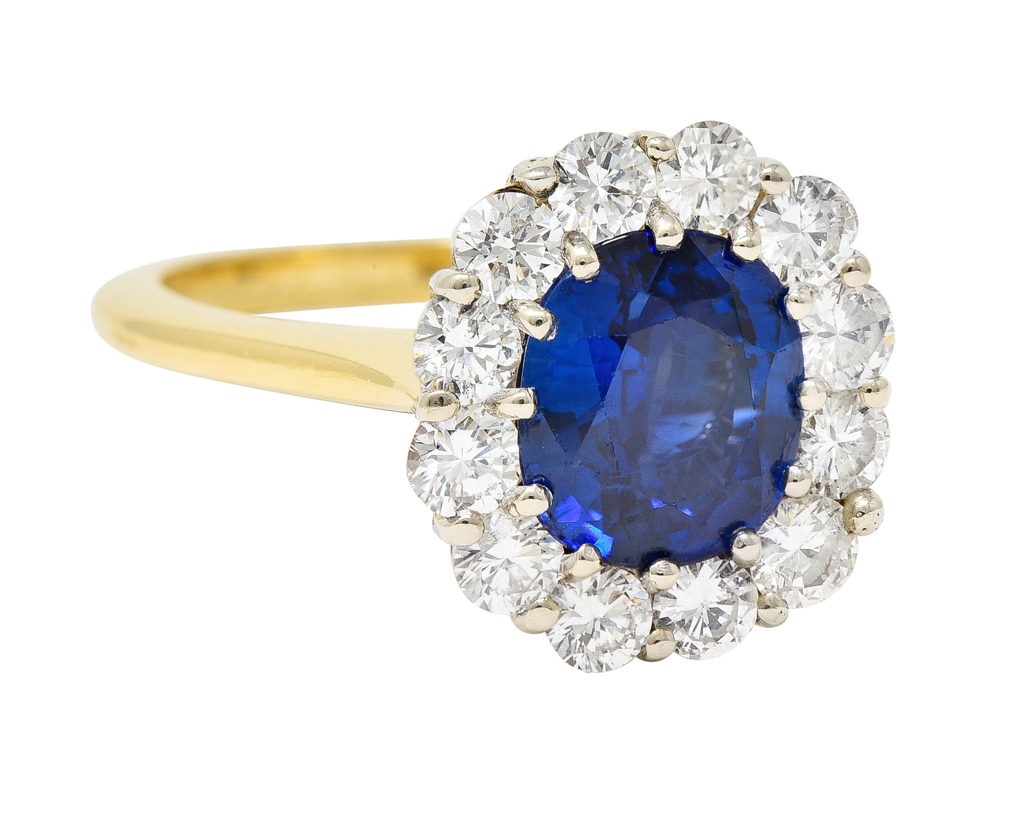 Vintage 3.25 CTW Cushion Cut Sapphire Diamond 18 Karat Two-Tone Vintage Halo Ring GIA Wilson's Estate Jewelry