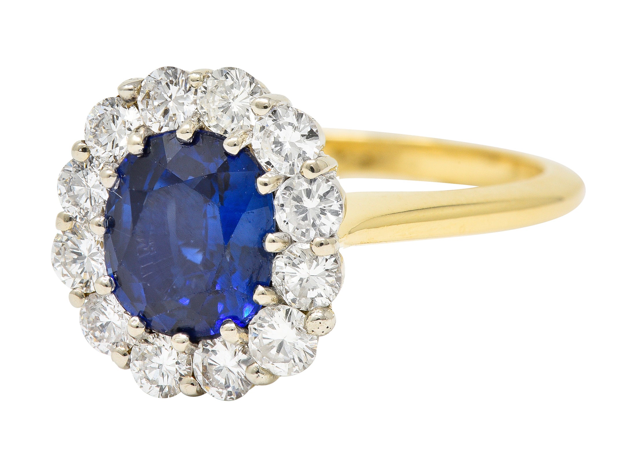 Vintage 3.25 CTW Cushion Cut Sapphire Diamond 18 Karat Two-Tone Vintage Halo Ring GIA Wilson's Estate Jewelry