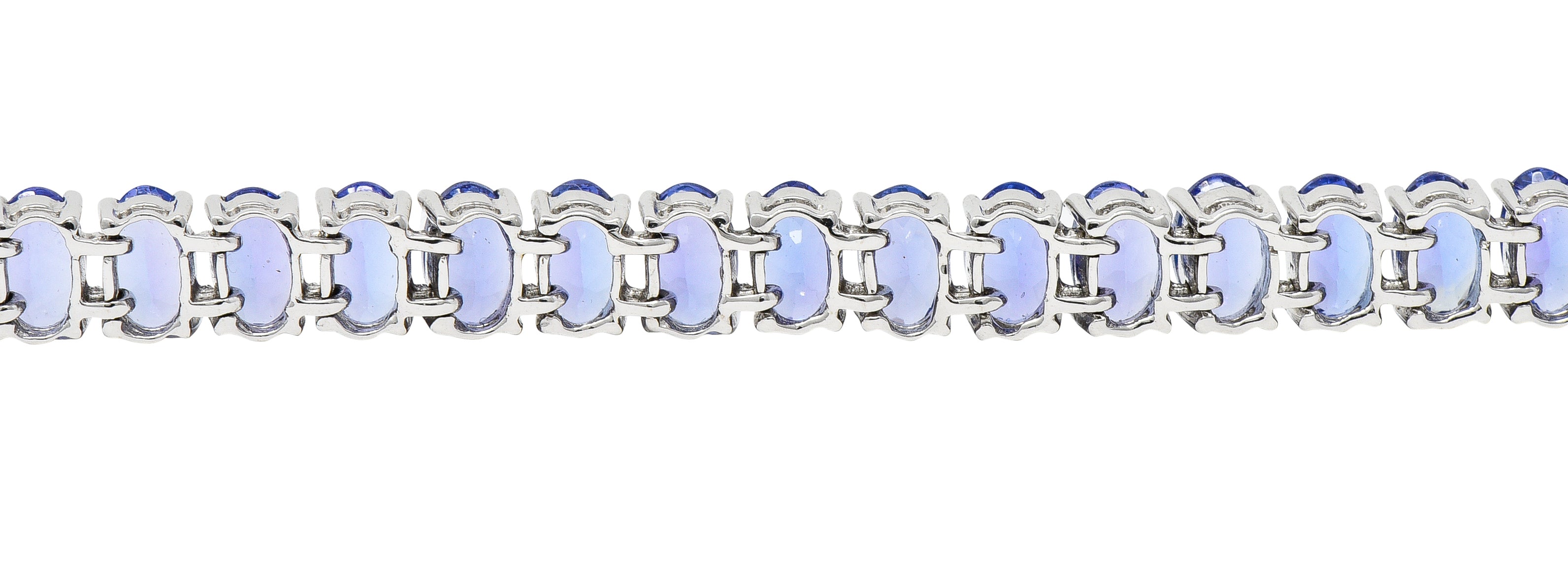 Contemporary 12.00 CTW Oval Cut Tanzanite 14 Karat White Gold Line Bracelet Wilson's Estate Jewelry