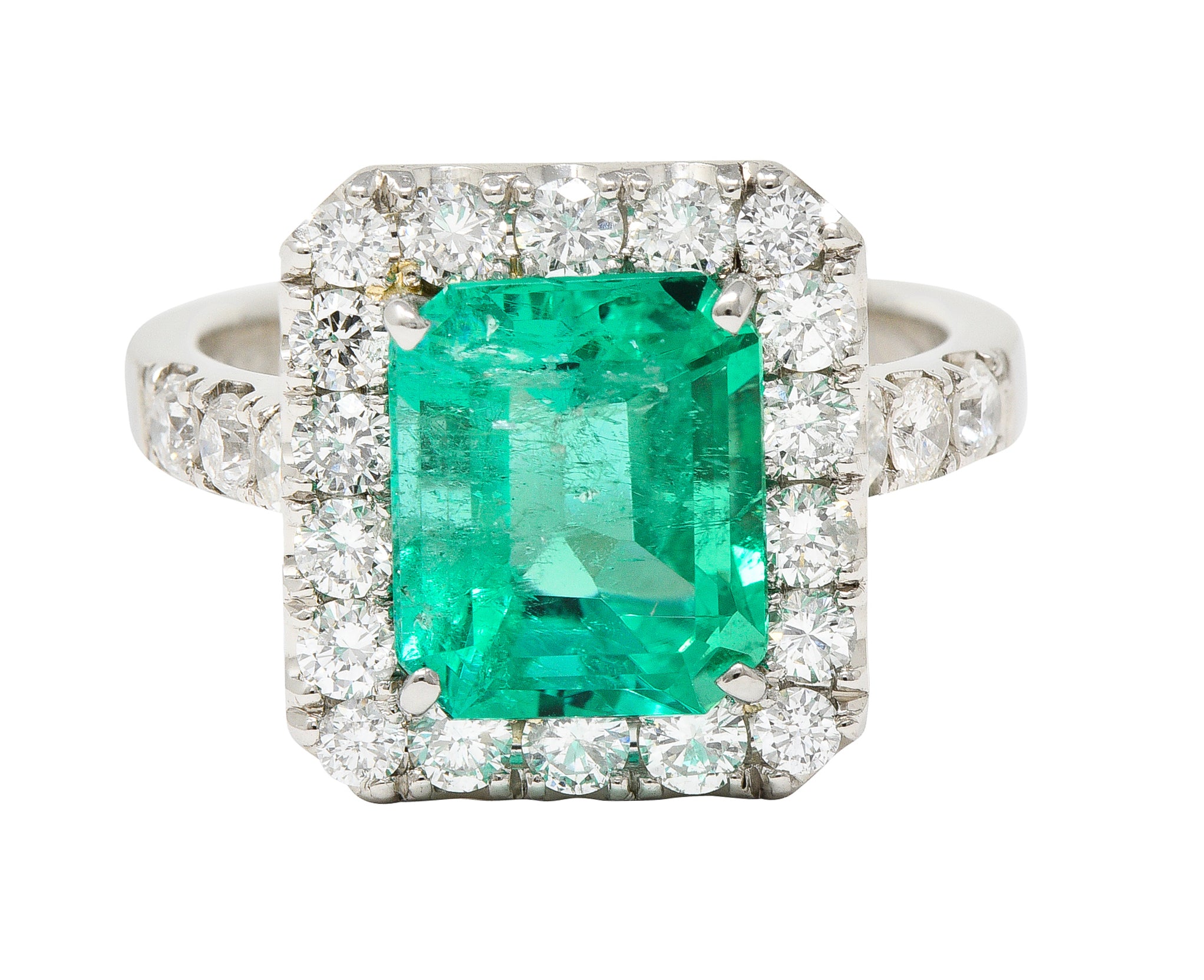 Contemporary 3.50 CTW Colombian Emerald Diamond Platinum Halo Ring GIA Wilson's Estate Jewelry